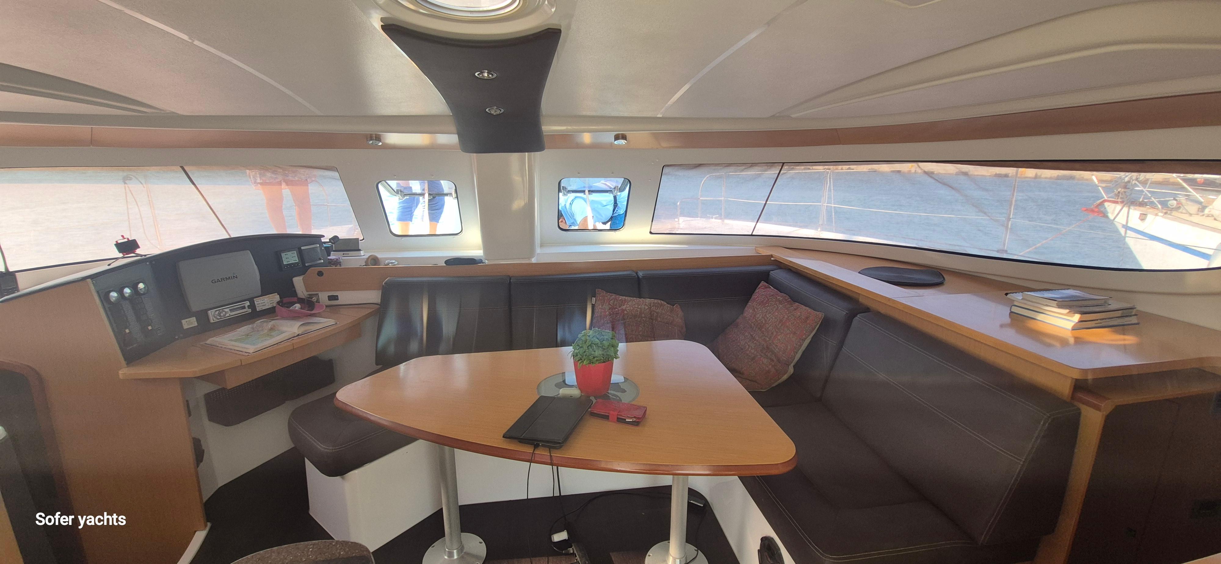 Interior of 2011 Fountaine Pajot Lipari 41 catamaran with seating and navigation area.