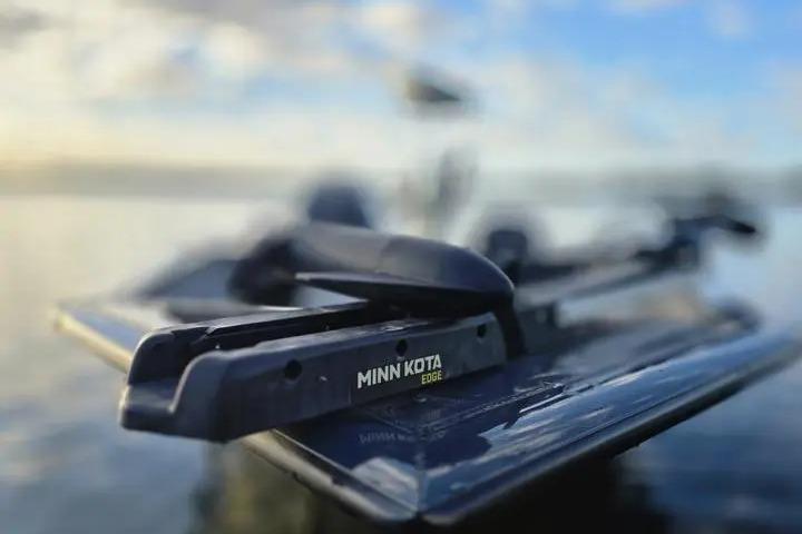 2020 Tracker Pro Team 175 TF boat with Minn Kota Edge trolling motor on calm water.