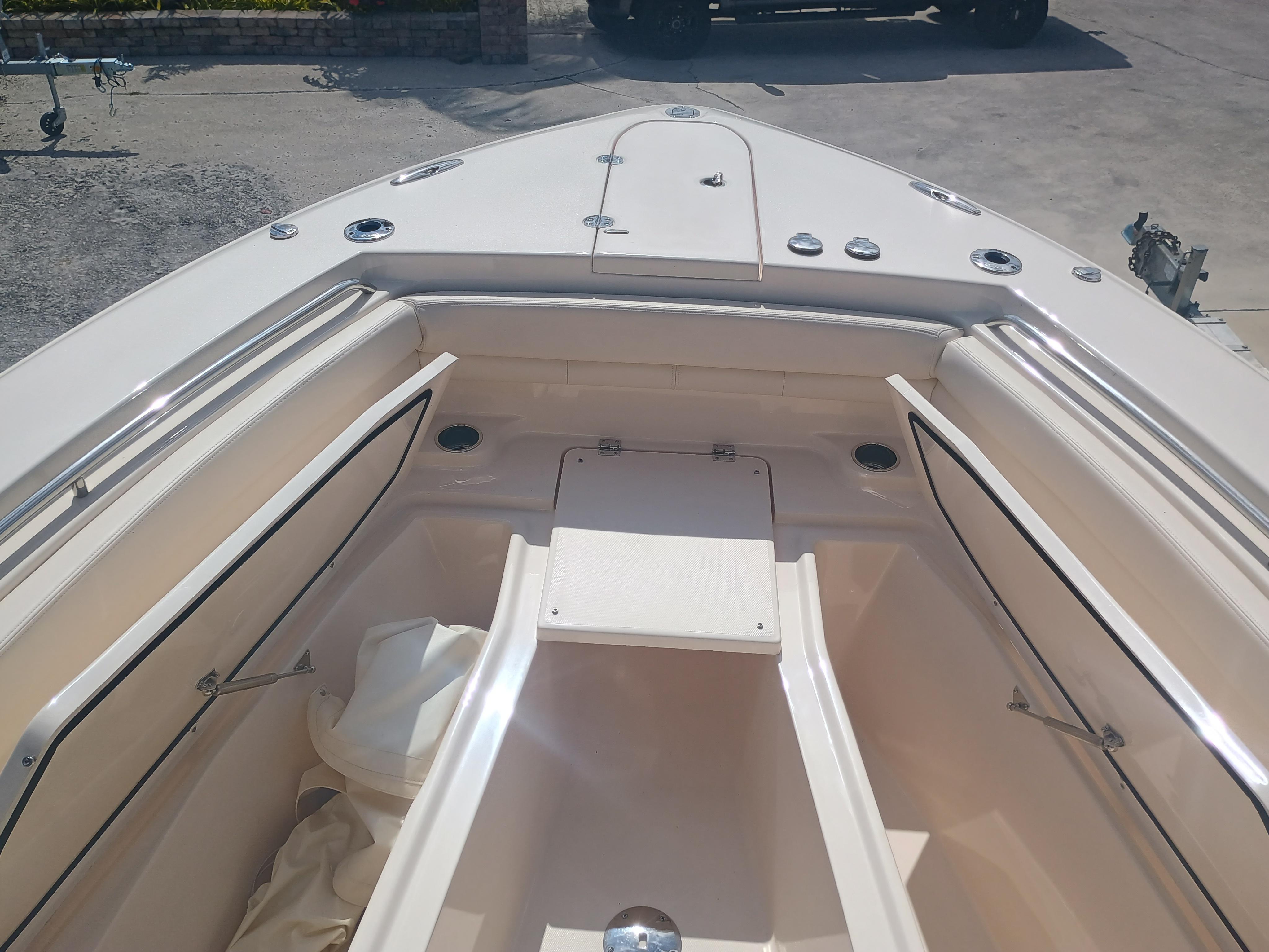 2025 Grady-White Canyon 306 boat interior, showcasing spacious seating and storage compartments.