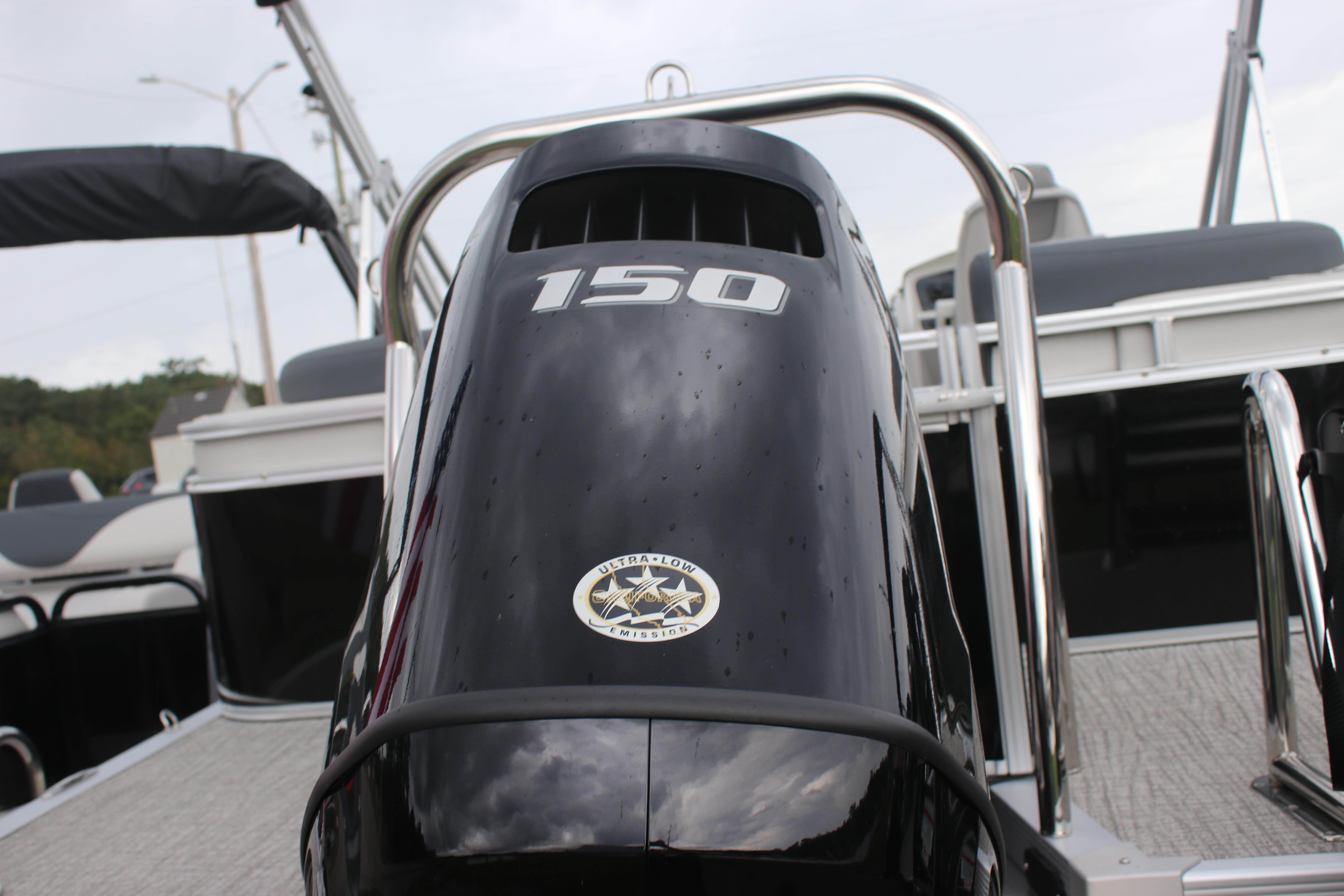 Avalon LSZ Quad Lounger 2025 with 150 horsepower engine, sleek black design.