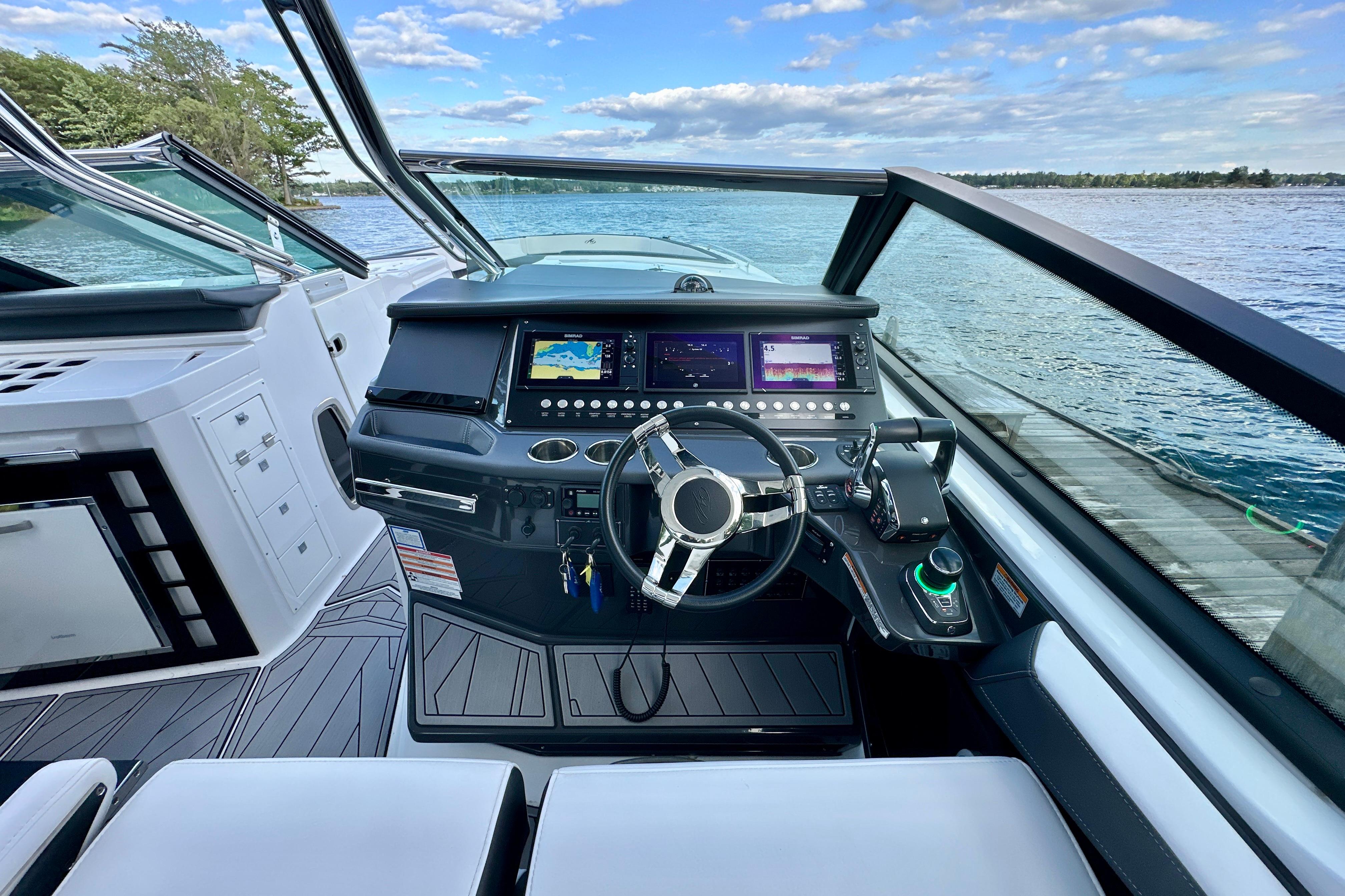 Cockpit view of 2022 Monterey 378SS Super Sport boat with advanced navigation system.