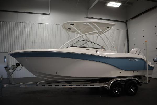 2025 Sea Fox 228 Traveler boat on trailer in indoor storage.