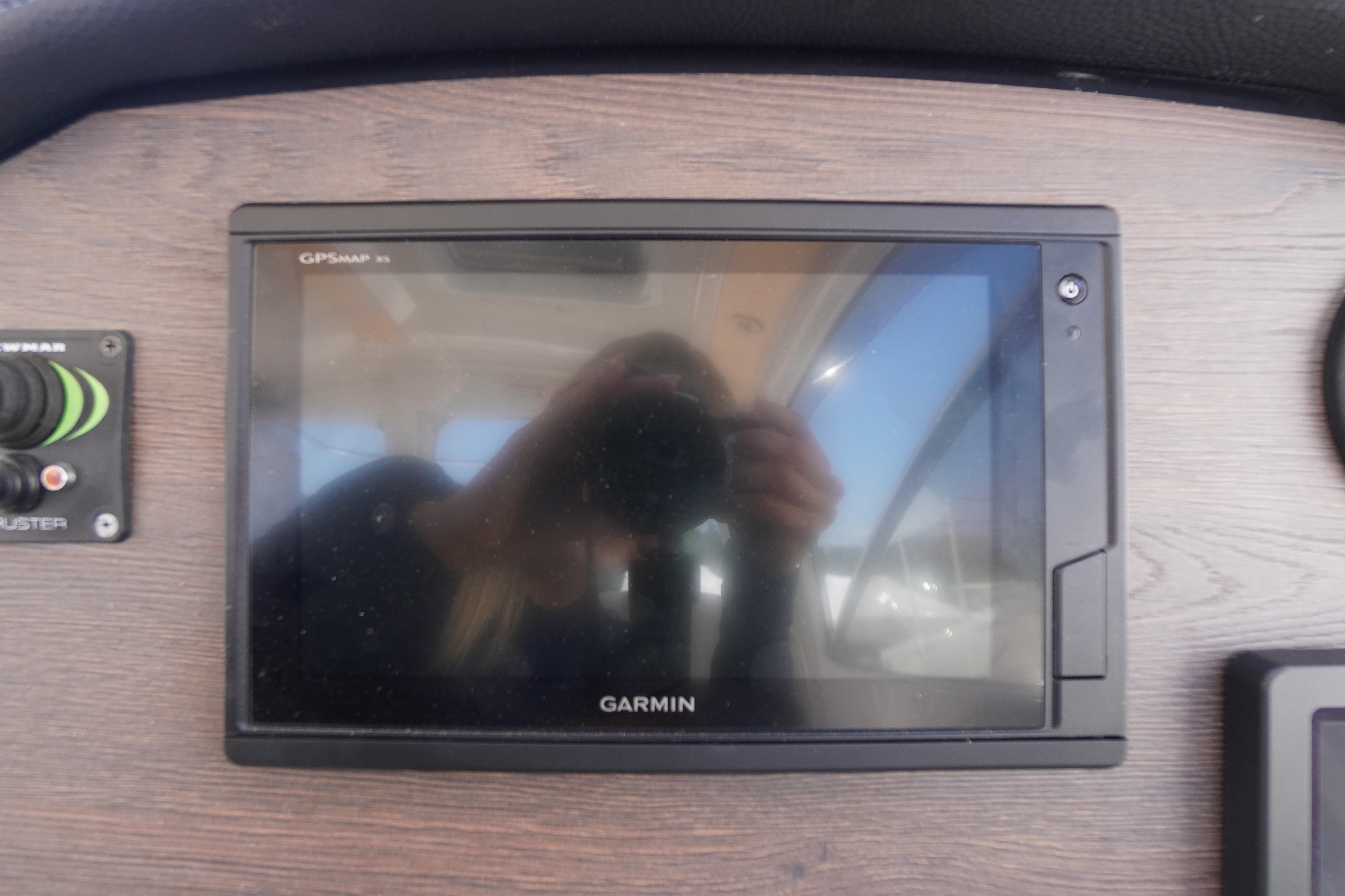Garmin GPSMAP display on 2019 Cutwater C-242 Sport Coupe dashboard.