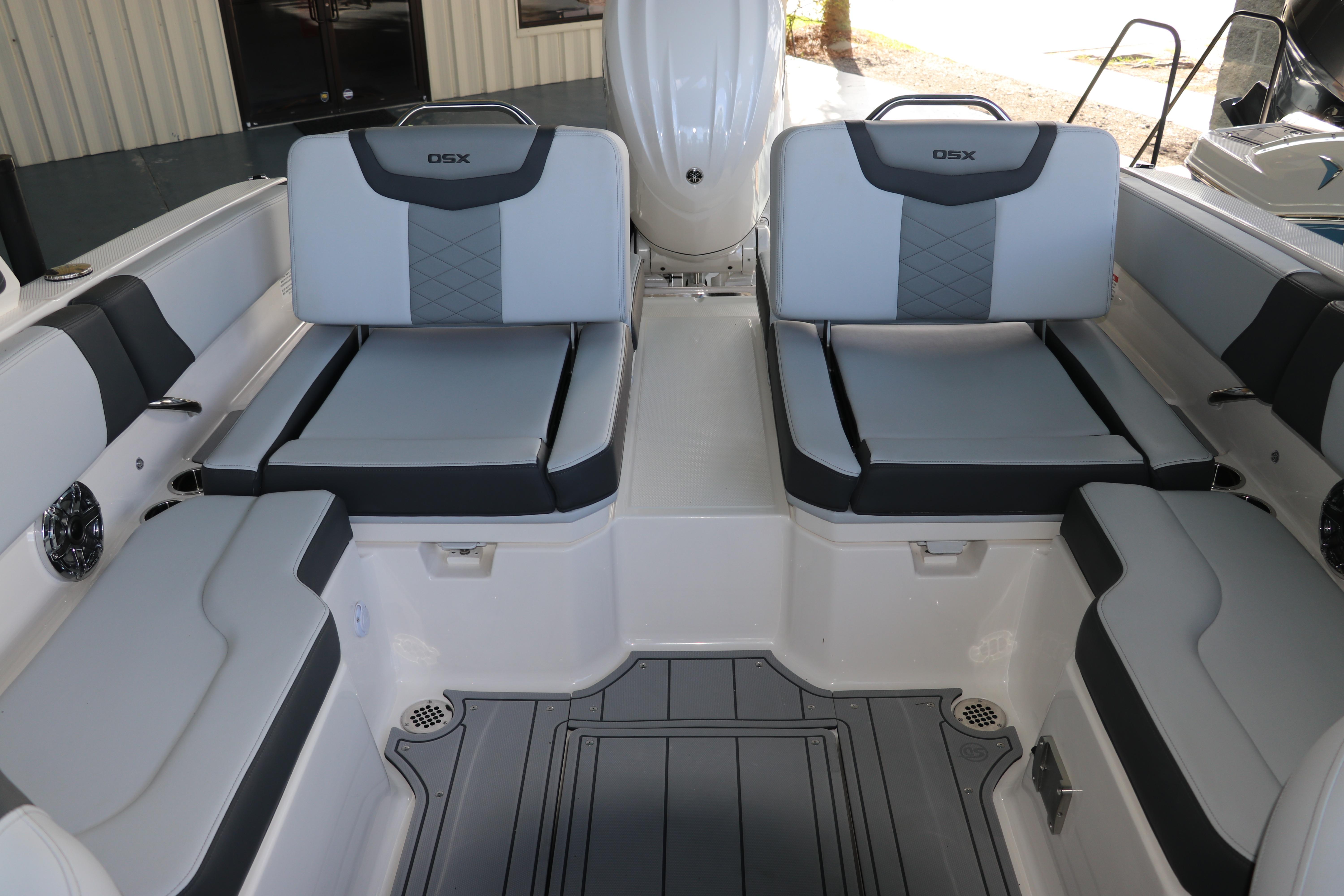 2026 Chaparral 250 OSX boat interior with stylish gray seating and modern design.