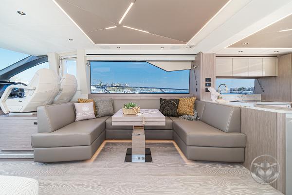 Luxurious interior of 2025 Sunseeker Manhattan 68 yacht with modern seating and panoramic views.