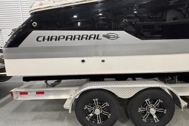 2026 Chaparral SSX 8 boat on trailer, showcasing sleek design and branding.