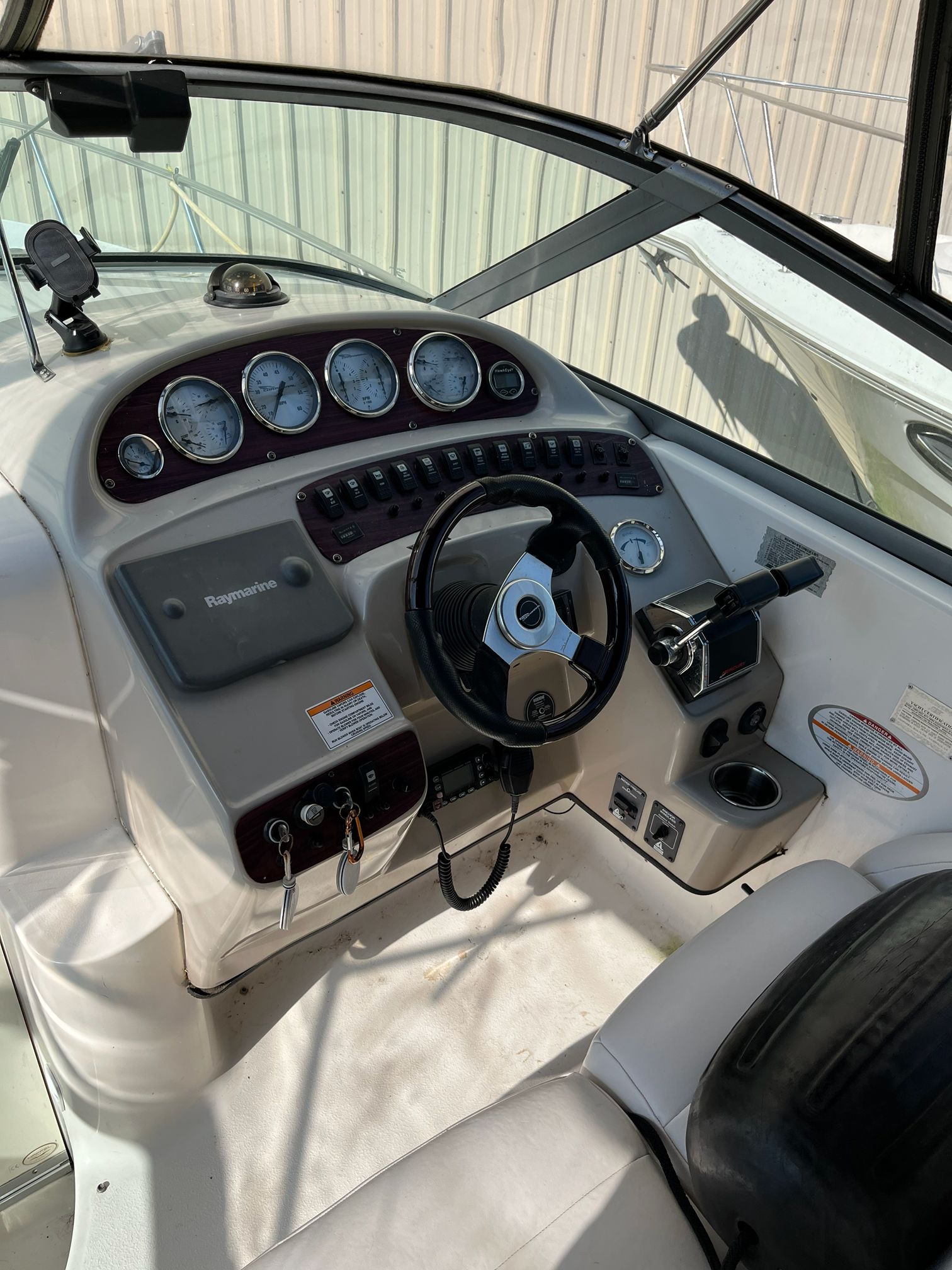 Cockpit of a 2000 Chaparral Signature boat with instruments.