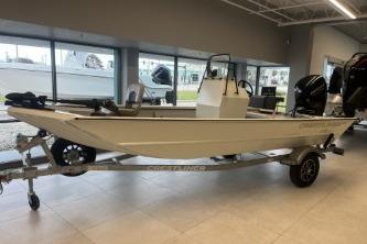 2026 Crestliner 1860 Retriever CC boat on trailer in showroom setting.