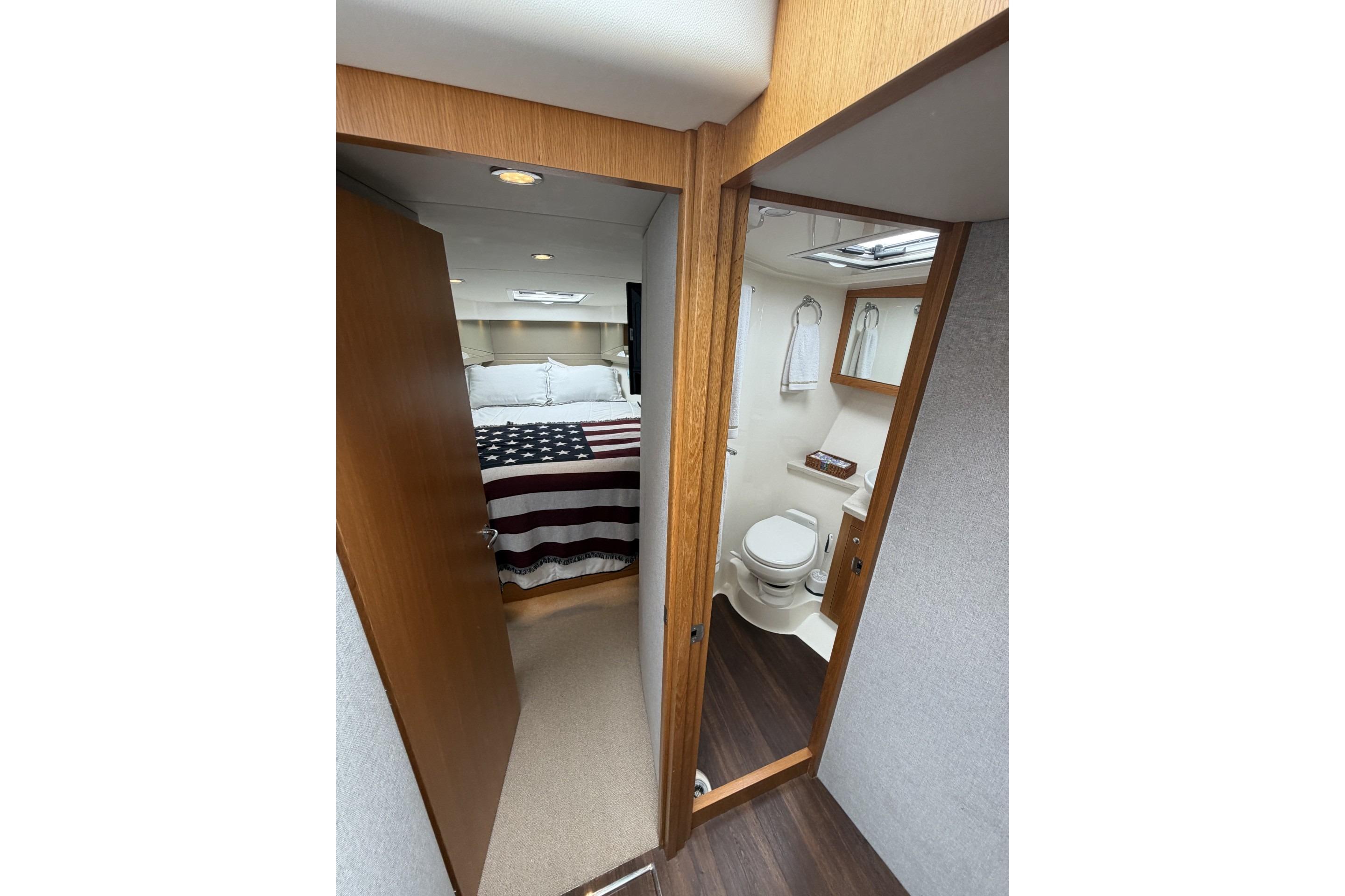 Master cabin foward with guest cabin and day head to starbord
