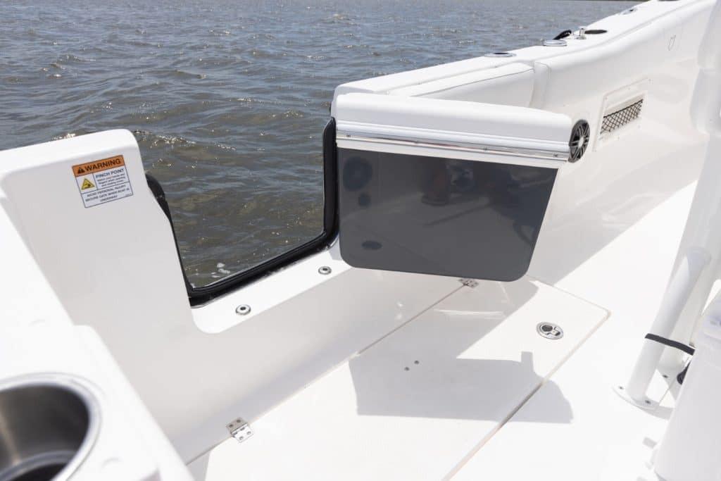 2027 Sea Fox 268 Commander boat deck with open side door, overlooking water.