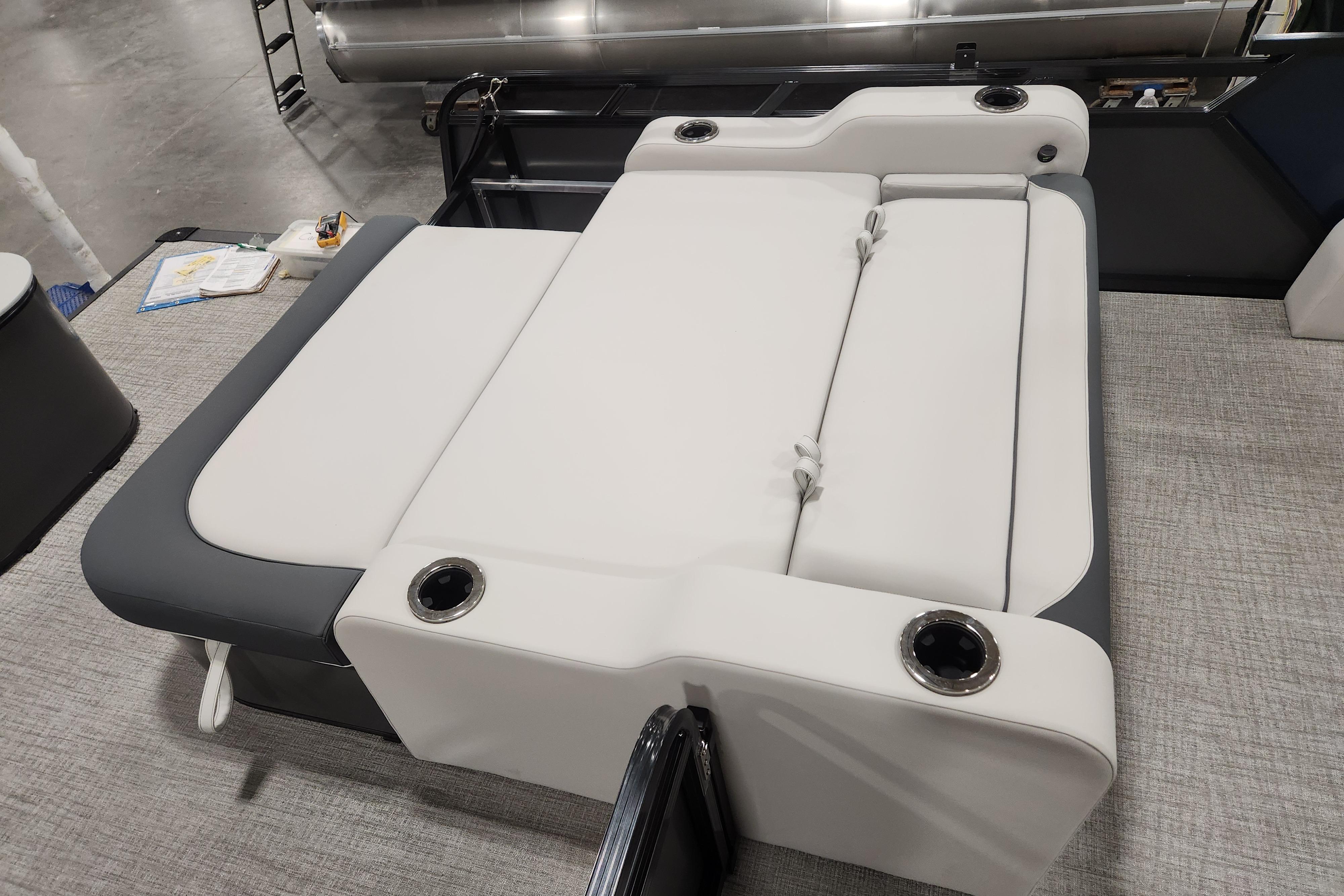 2026 Tahoe Pontoon 23 LTZ Rear Bench with sleek white and gray upholstery.