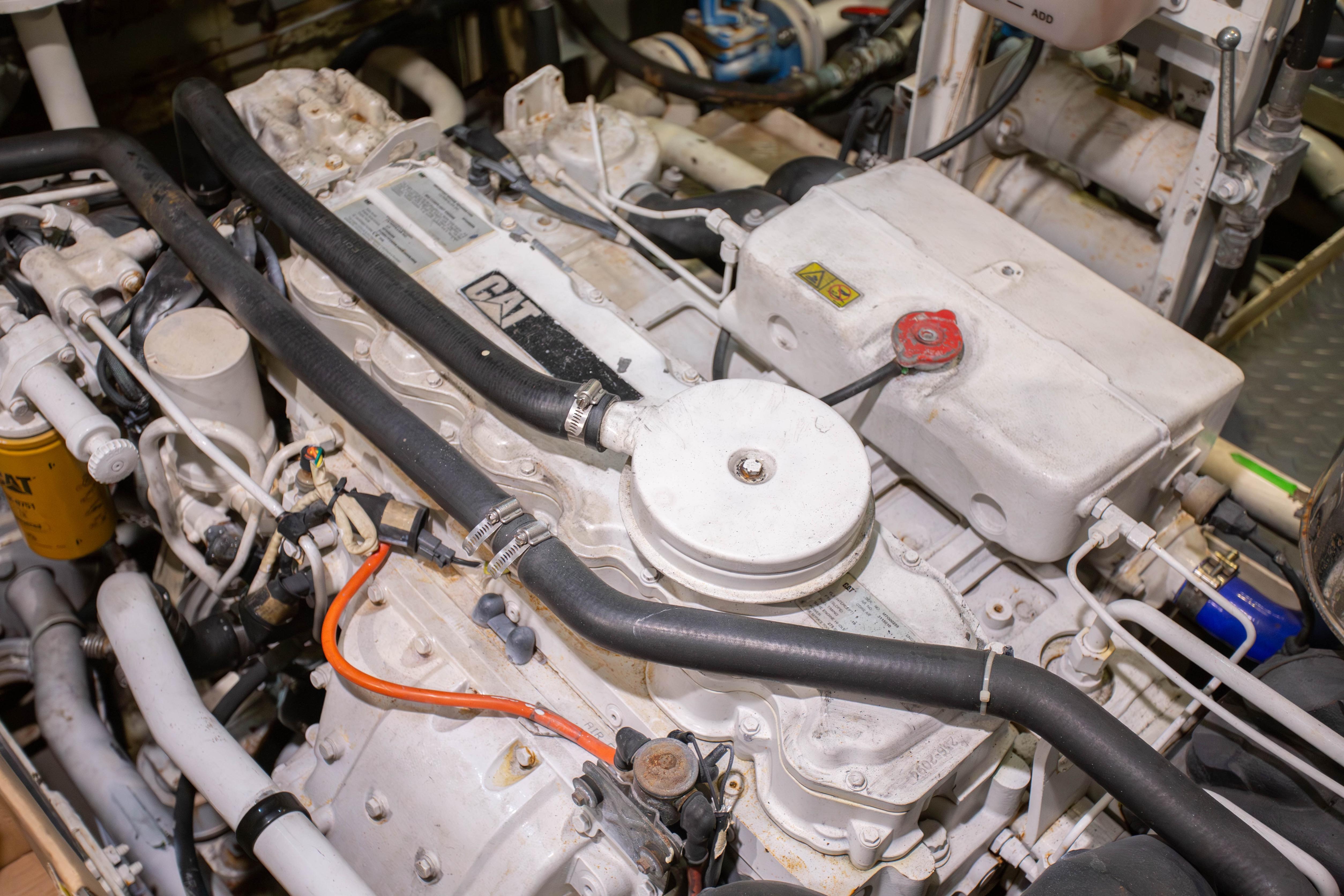 Engine room of 2014 Fifth Ocean Yachts 24m Displacement Explorer Yacht, featuring CAT machinery.