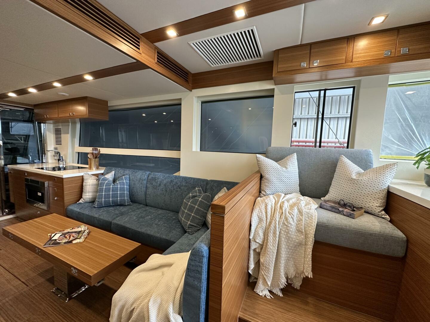 Luxurious interior of 2026 Outback Yachts Outback 50 with modern seating and decor.