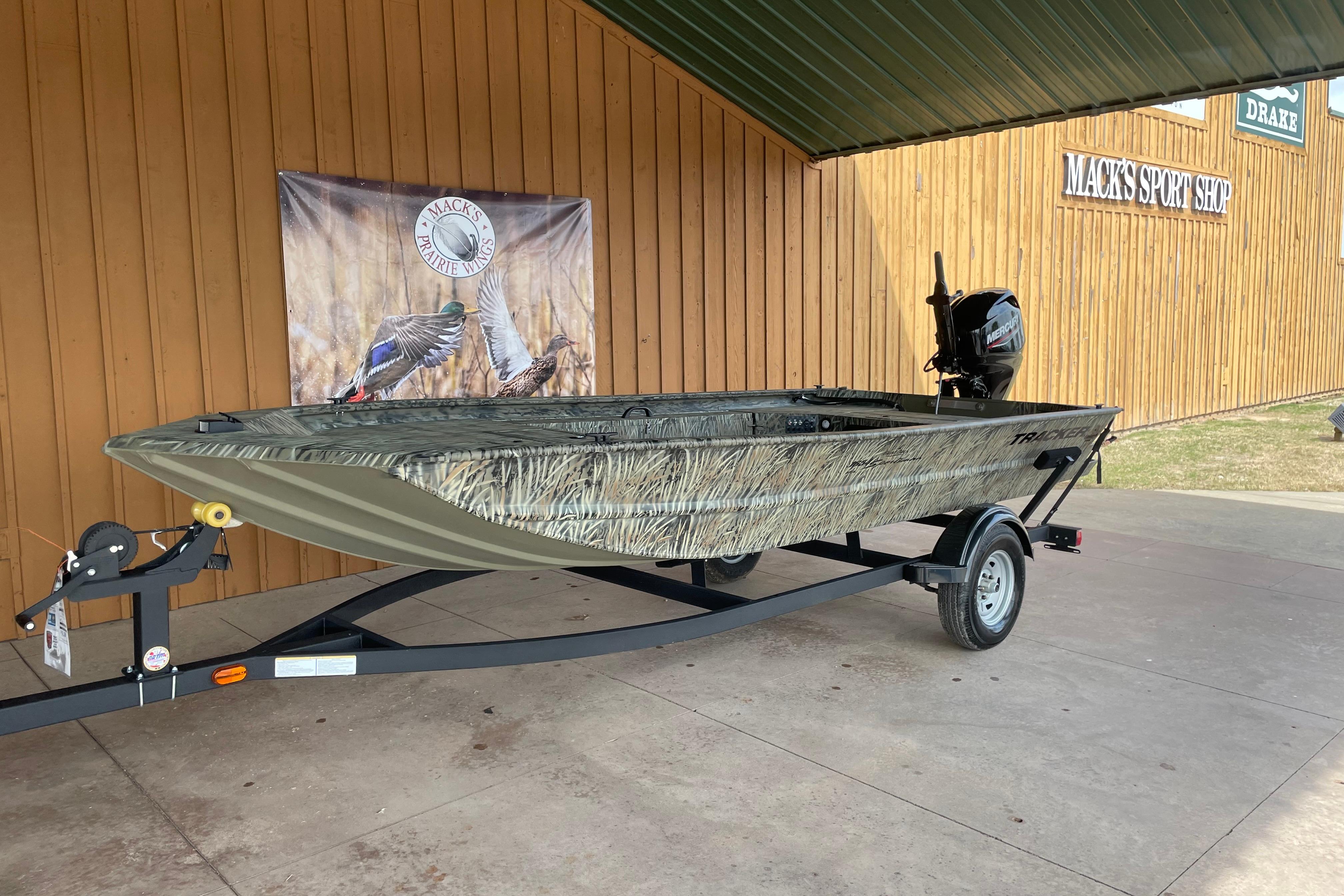 2026 Tracker Grizzly 1654 T Sportsman boat on trailer at Mack's Sport Shop.