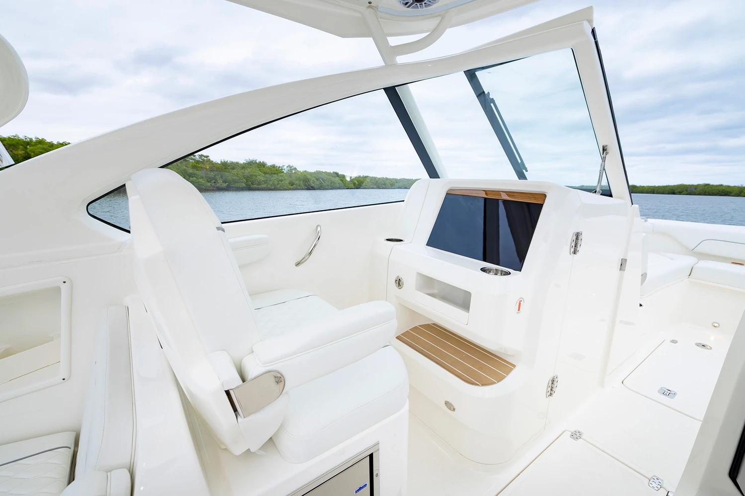 Manufacturer Provided Image: 2026 Pursuit DC 286 Dual Console boat interior with sleek white seating and modern design.