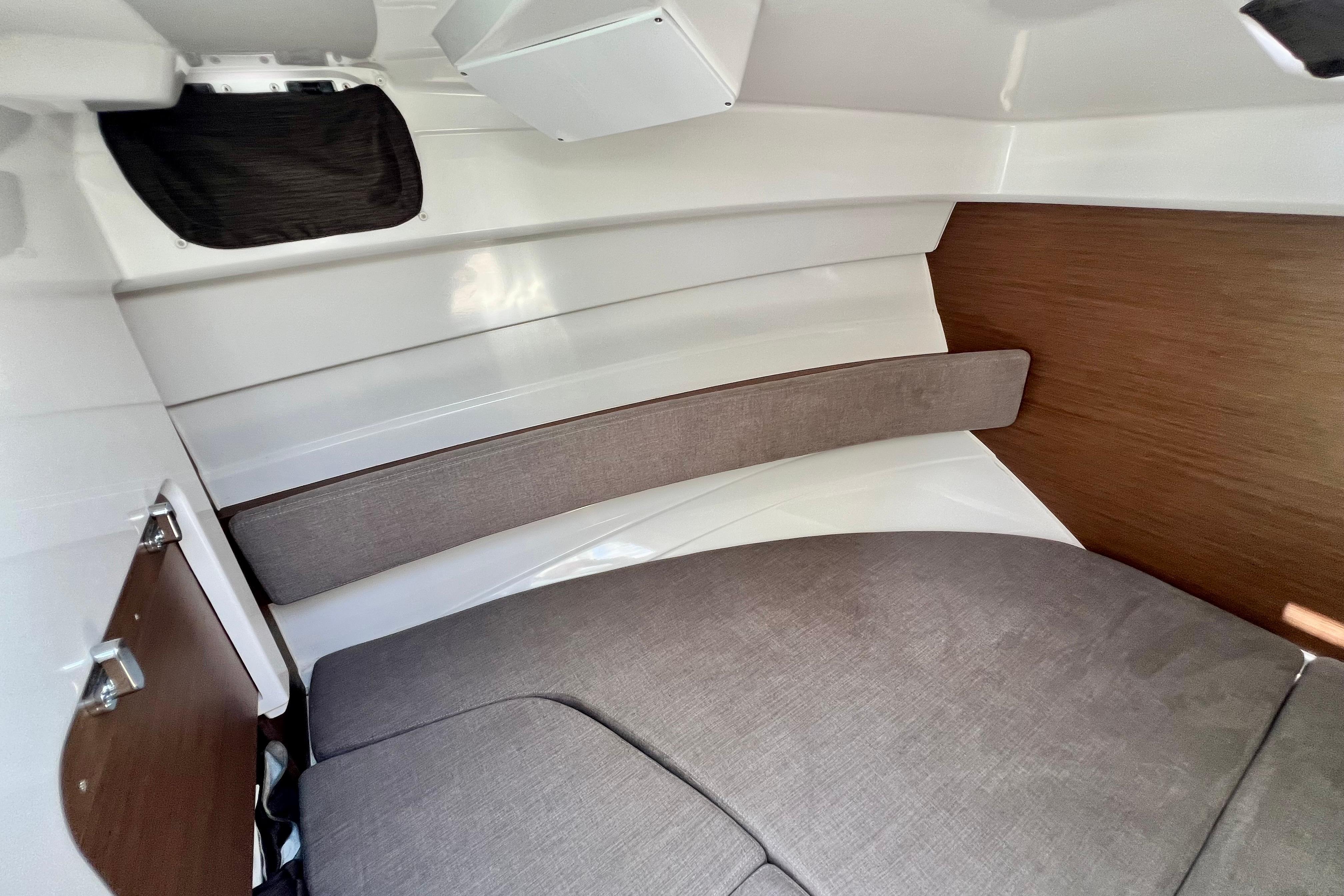 Interior cabin of 2023 Beneteau Antares 8, featuring modern design and comfortable seating.