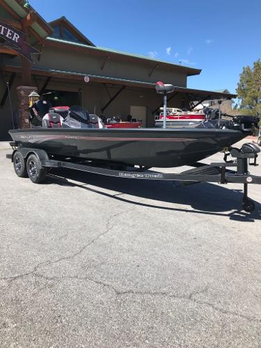 2025 Ranger ALPHA 208 boat on trailer, parked outdoors near a building.