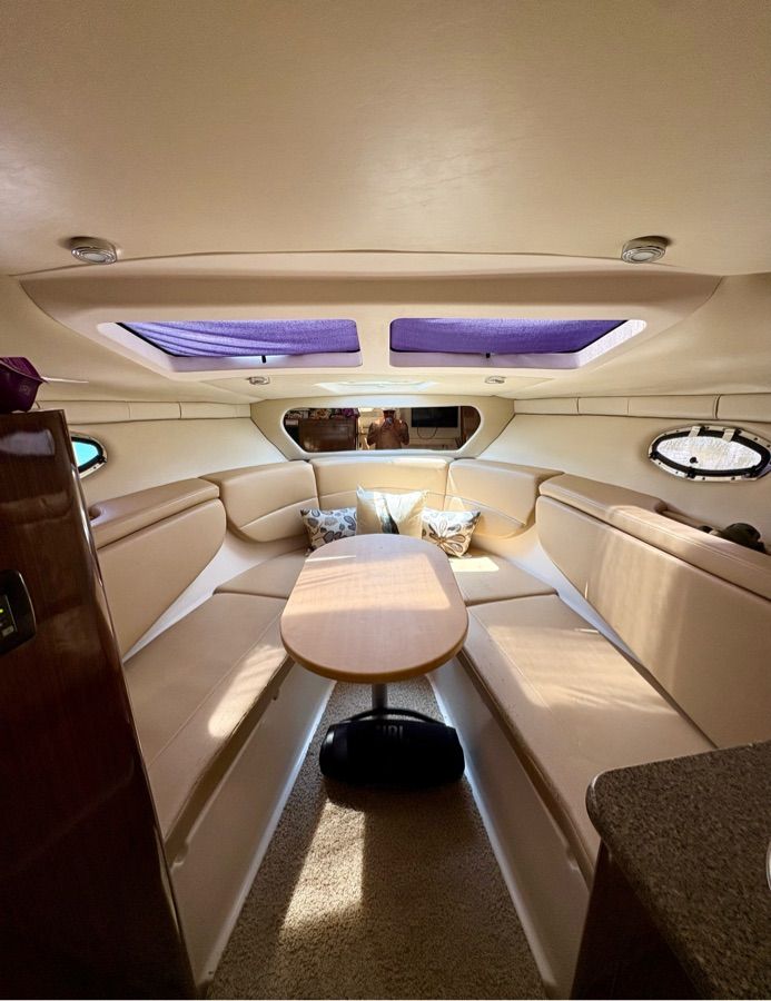 Interior of the 2014 Regal 30 Express with seating area and table.