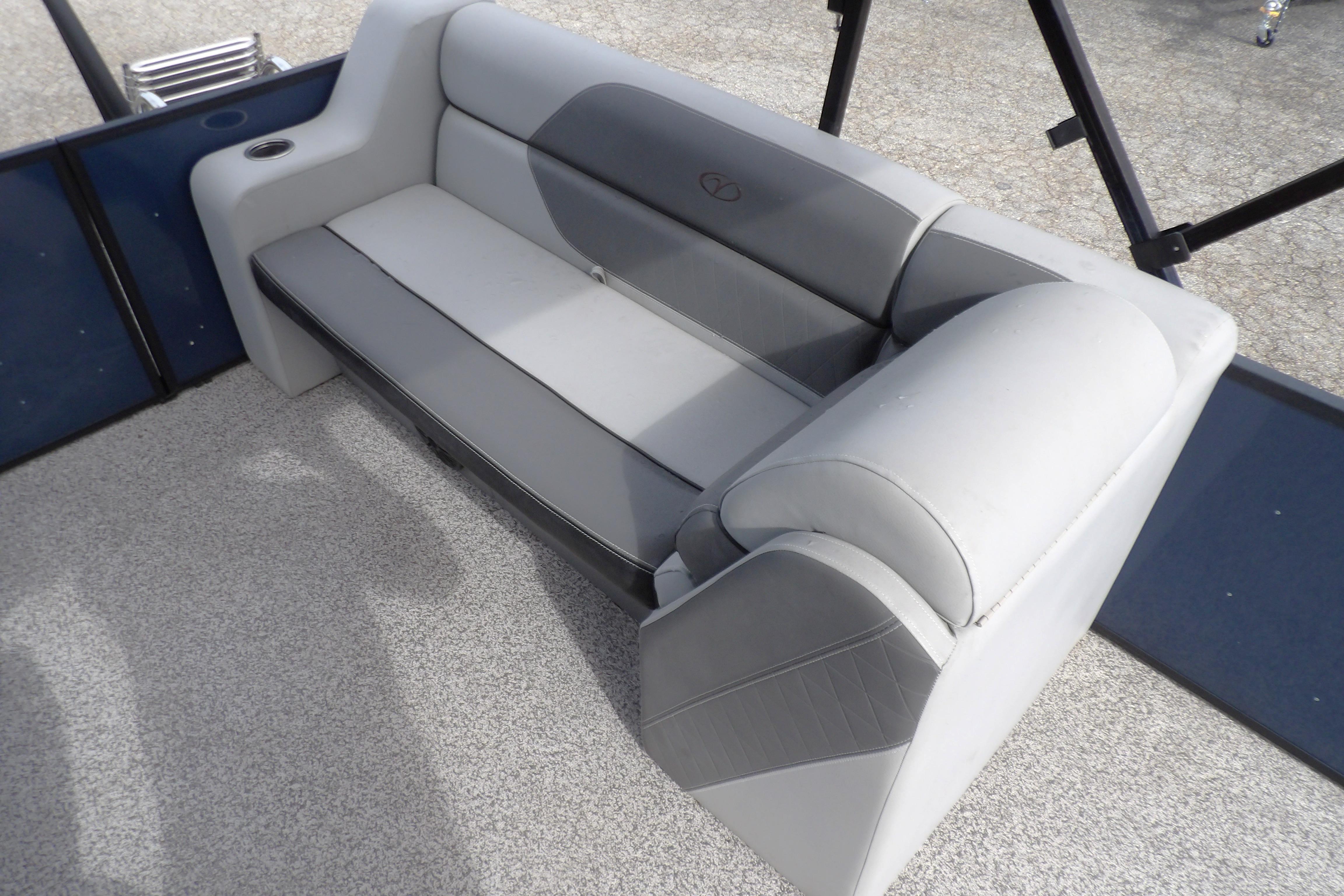 Veranda Vista View 22RC 2022 boat interior with gray seating and cup holder.