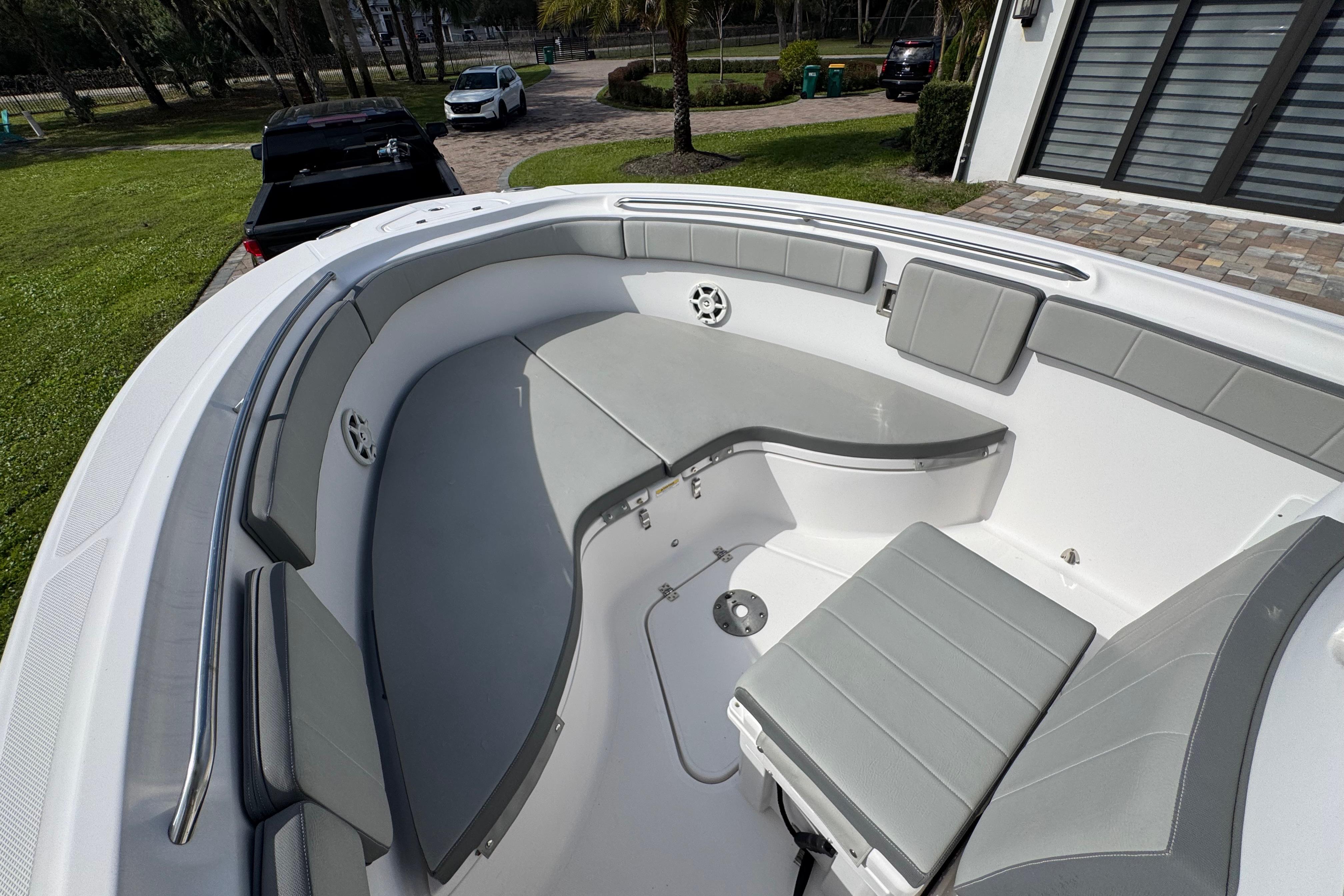 2022 Aquasport 2500 Center Console boat with spacious seating and modern design.