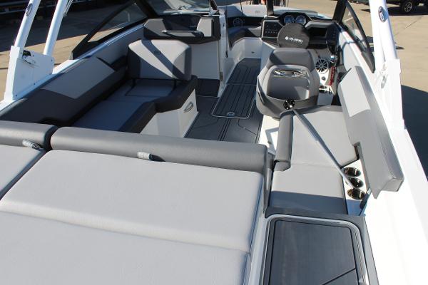 2025 Cobalt CS23 boat interior with sleek seating and modern dashboard.