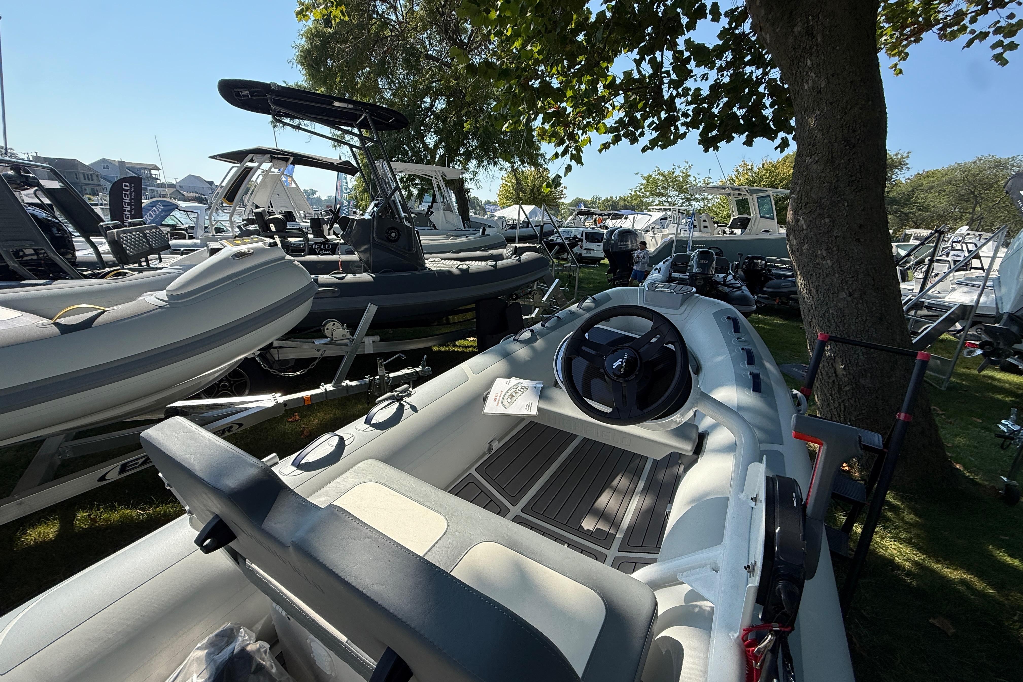 2025 Highfield Classic 380 boat displayed outdoors among other boats.