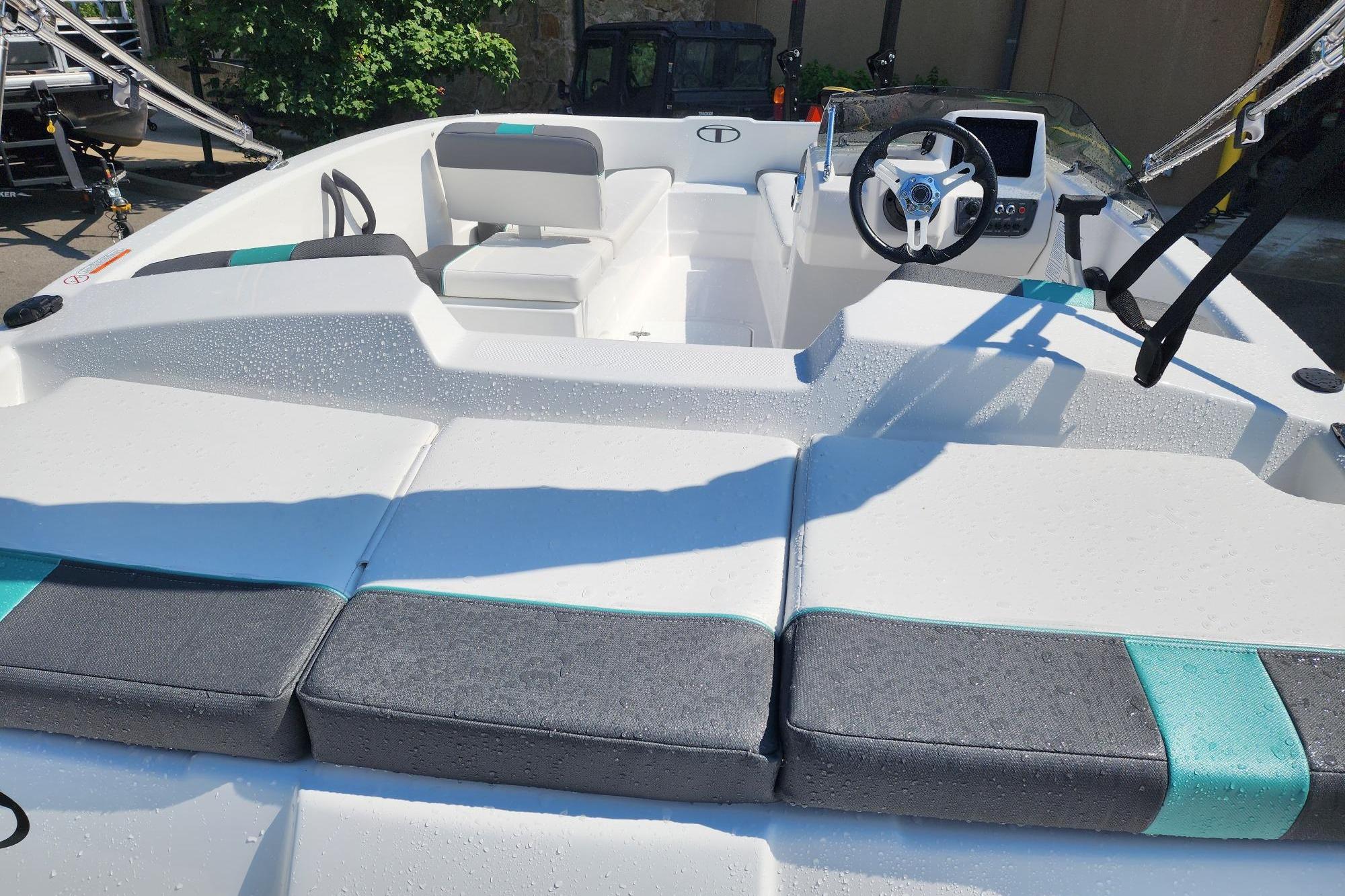 2026 Tahoe T16 boat interior with modern seating and steering wheel.