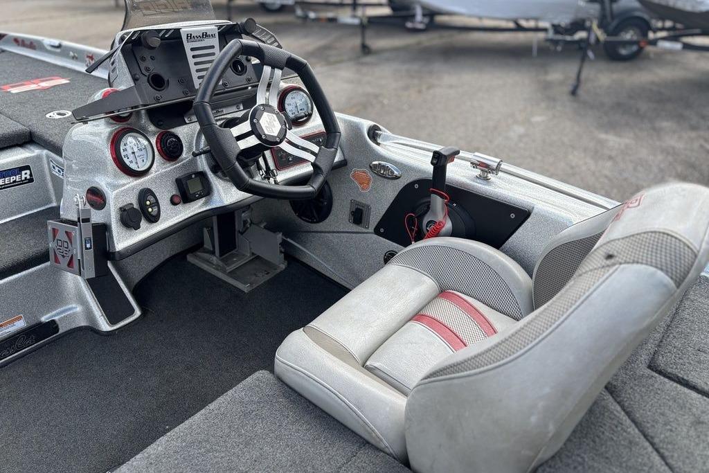 2020 Bass Cat Cougar FTD boat cockpit with steering wheel and gauges.