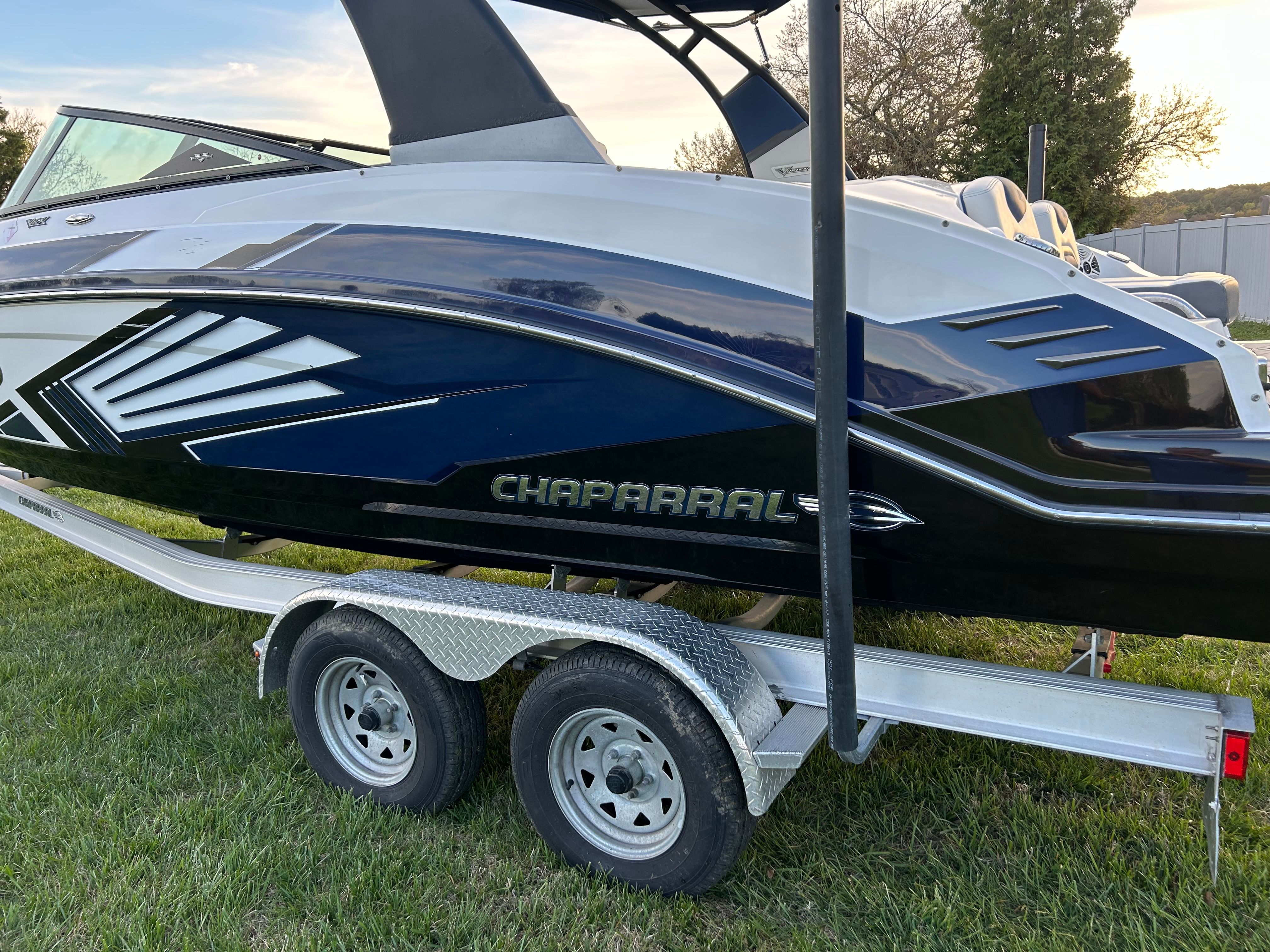 2015 Chaparral Vortex 243 VRX boat on trailer outdoors.