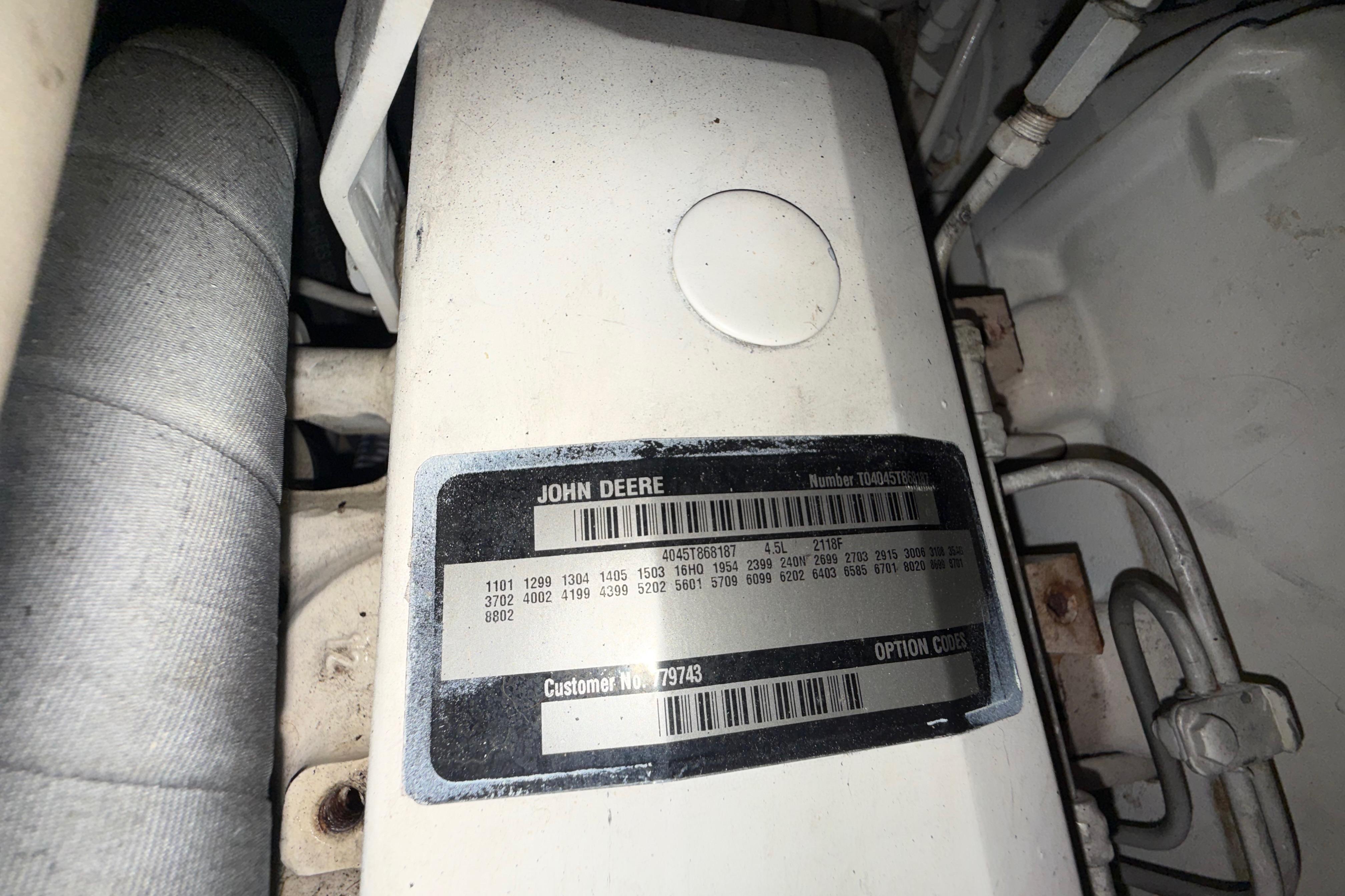 Engine label on a 2001 Kadey-Krogen 39, featuring John Deere specifications and codes.