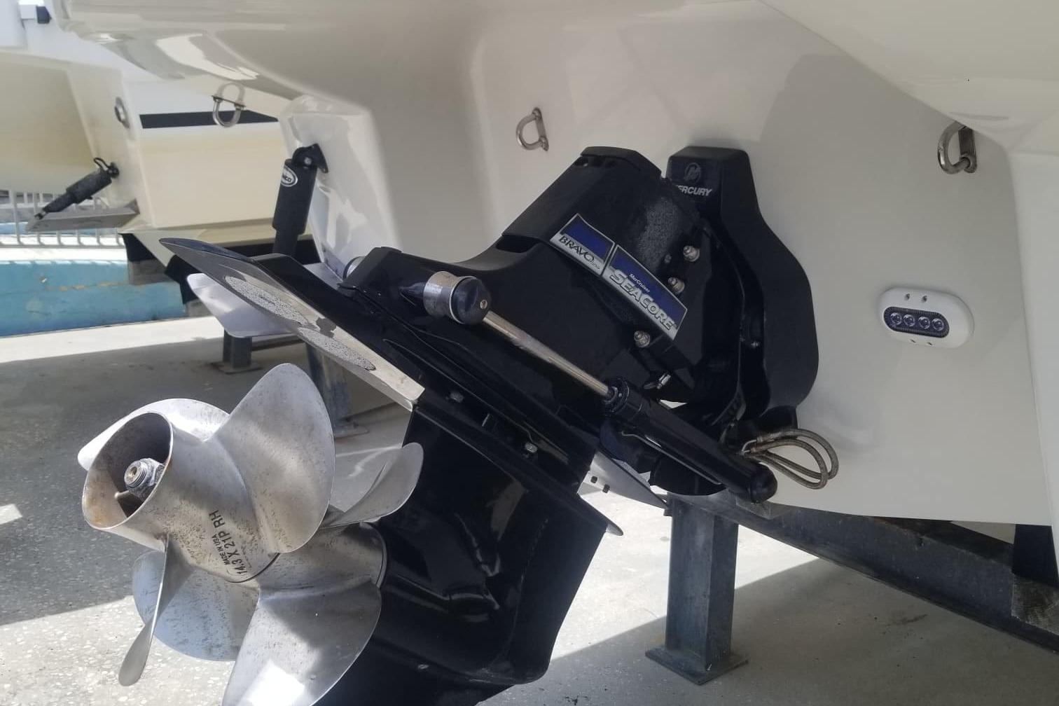 2018 Crownline 264 CR boat with Mercury Bravo Three outdrive and stainless steel propeller.
