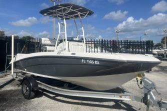 2016 Yamaha Boats 190 FSH Sport on trailer, parked outdoors under blue sky.