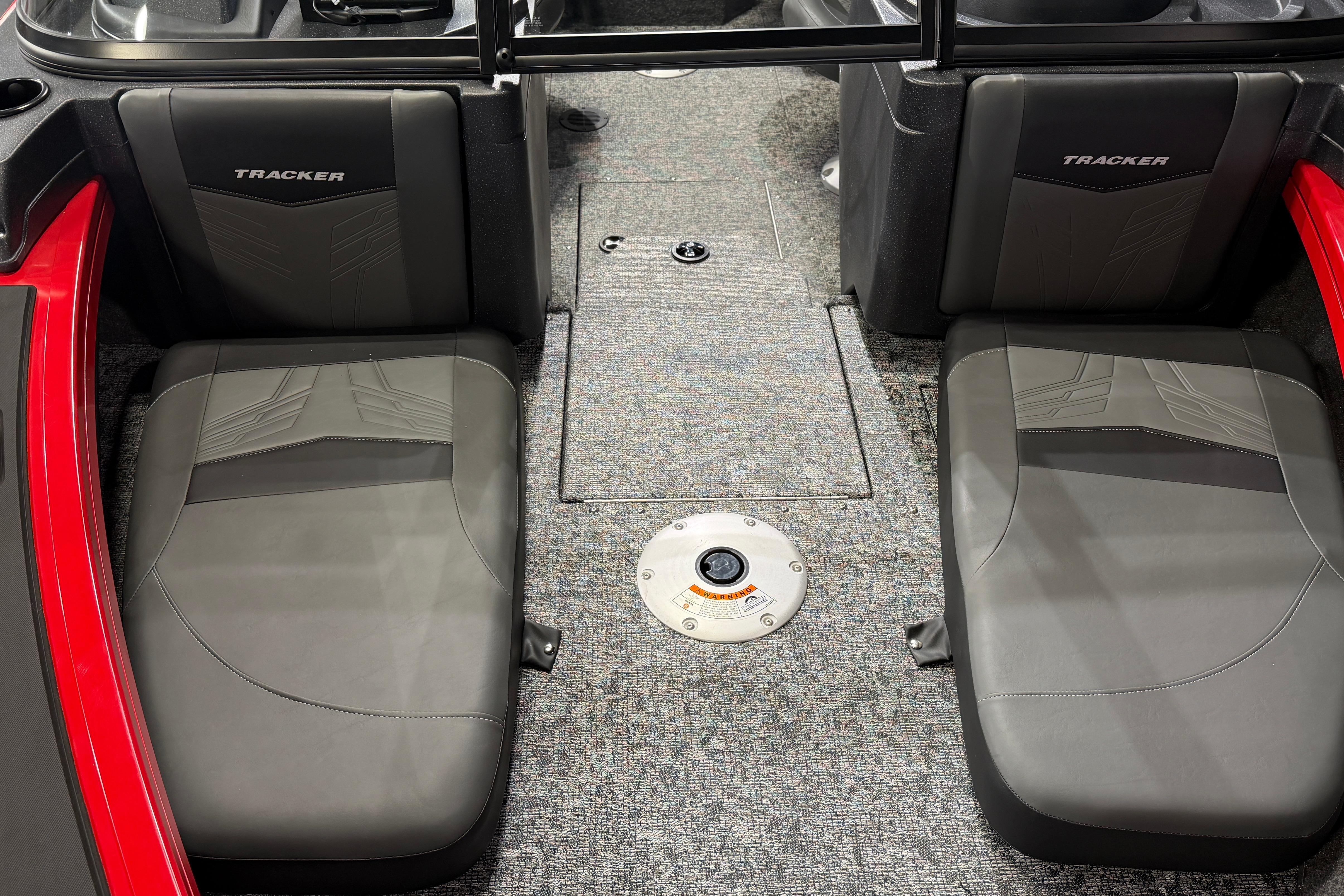 2026 Tracker Targa V-18 Combo boat interior with gray seats and red accents.