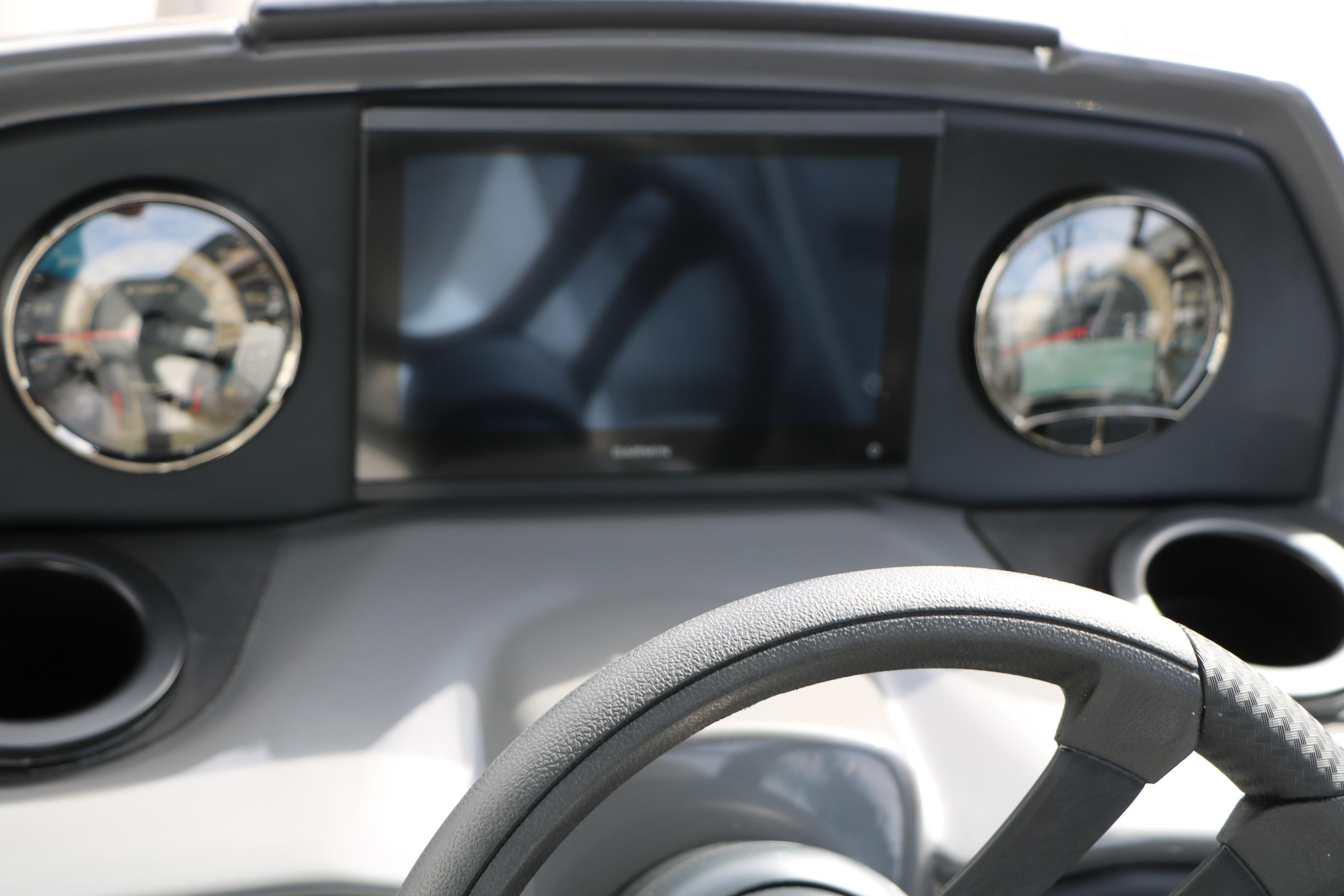 Dashboard of 2026 Evotti 521QL with steering wheel and digital display.