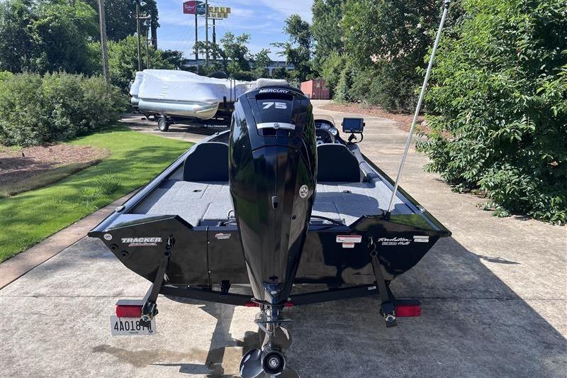 2021 Tracker Pro Team 175 TXW boat with Mercury 75 engine, parked outdoors.