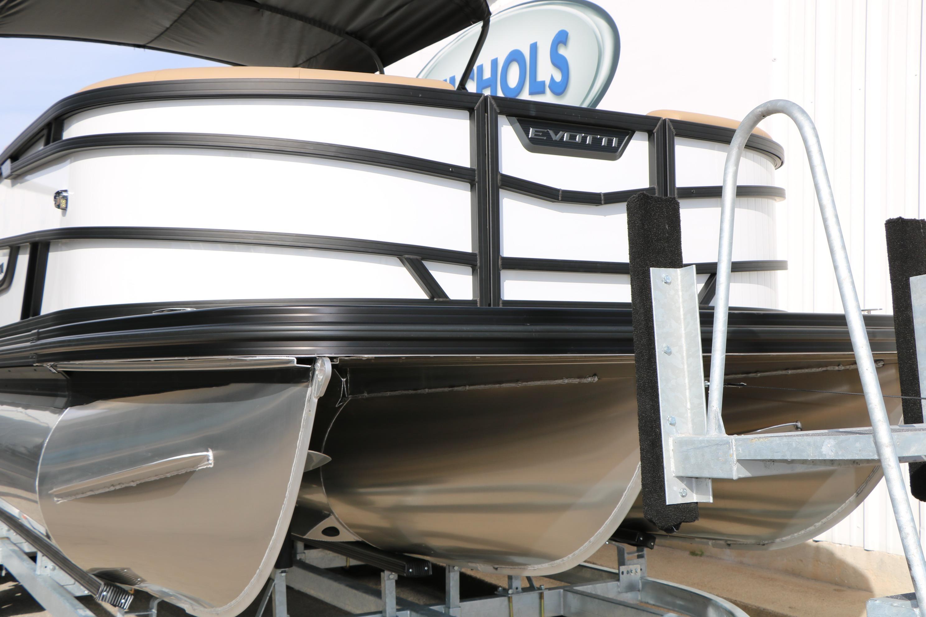 2026 Evotti 523CS pontoon boat on trailer, showcasing sleek design and modern features.