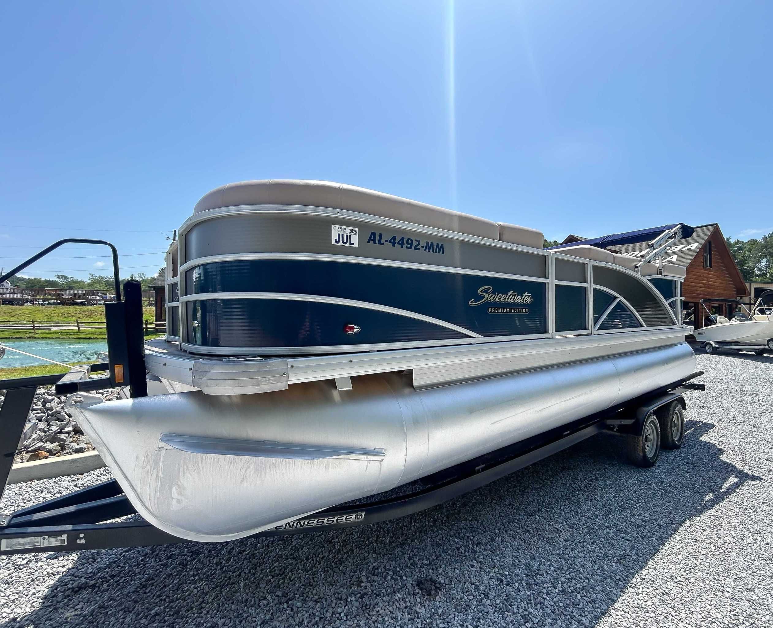 2014 Sweetwater 200 Premium Edition pontoon boat on trailer.