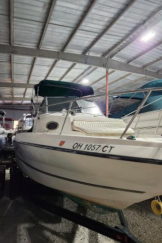 2000 Renken Seamaster 2288 WA boat stored in a covered facility.
