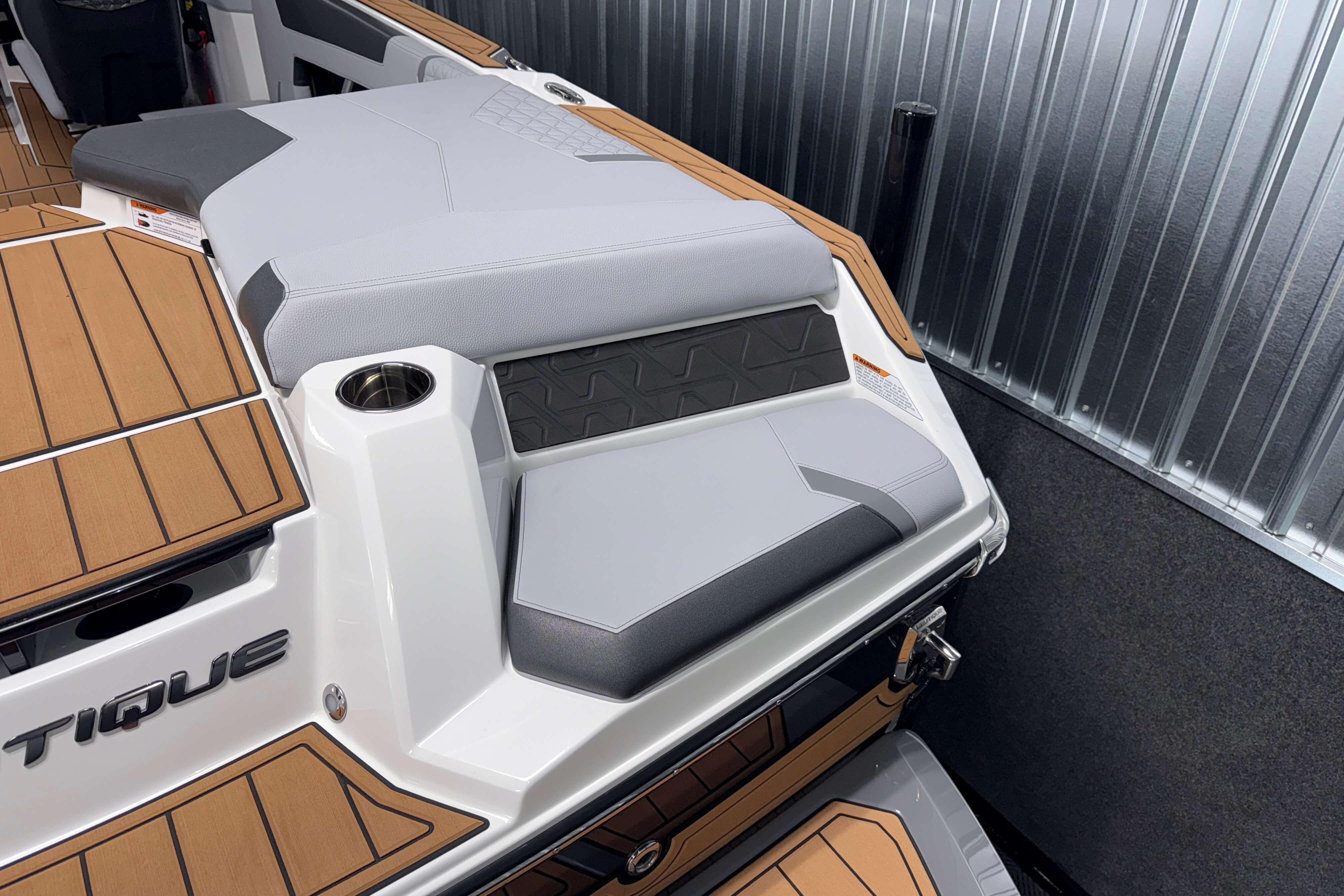 2026 Nautique Super Air Nautique GS22 boat interior with sleek seating and wood accents.
