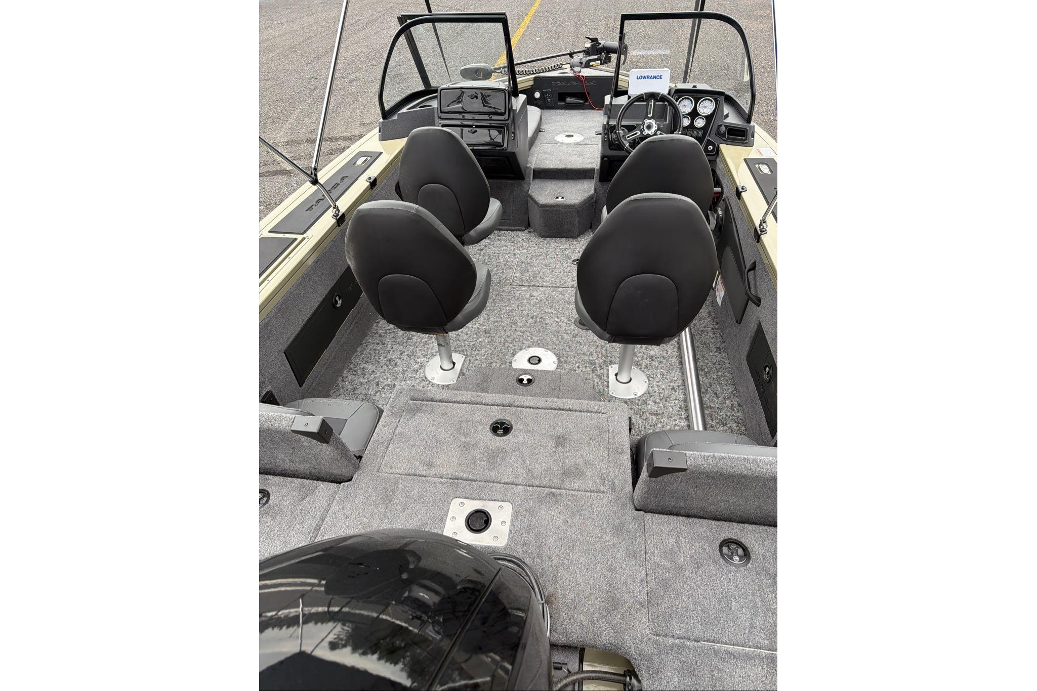 2026 Tracker Targa V-18 Combo boat interior with seating and dashboard view.