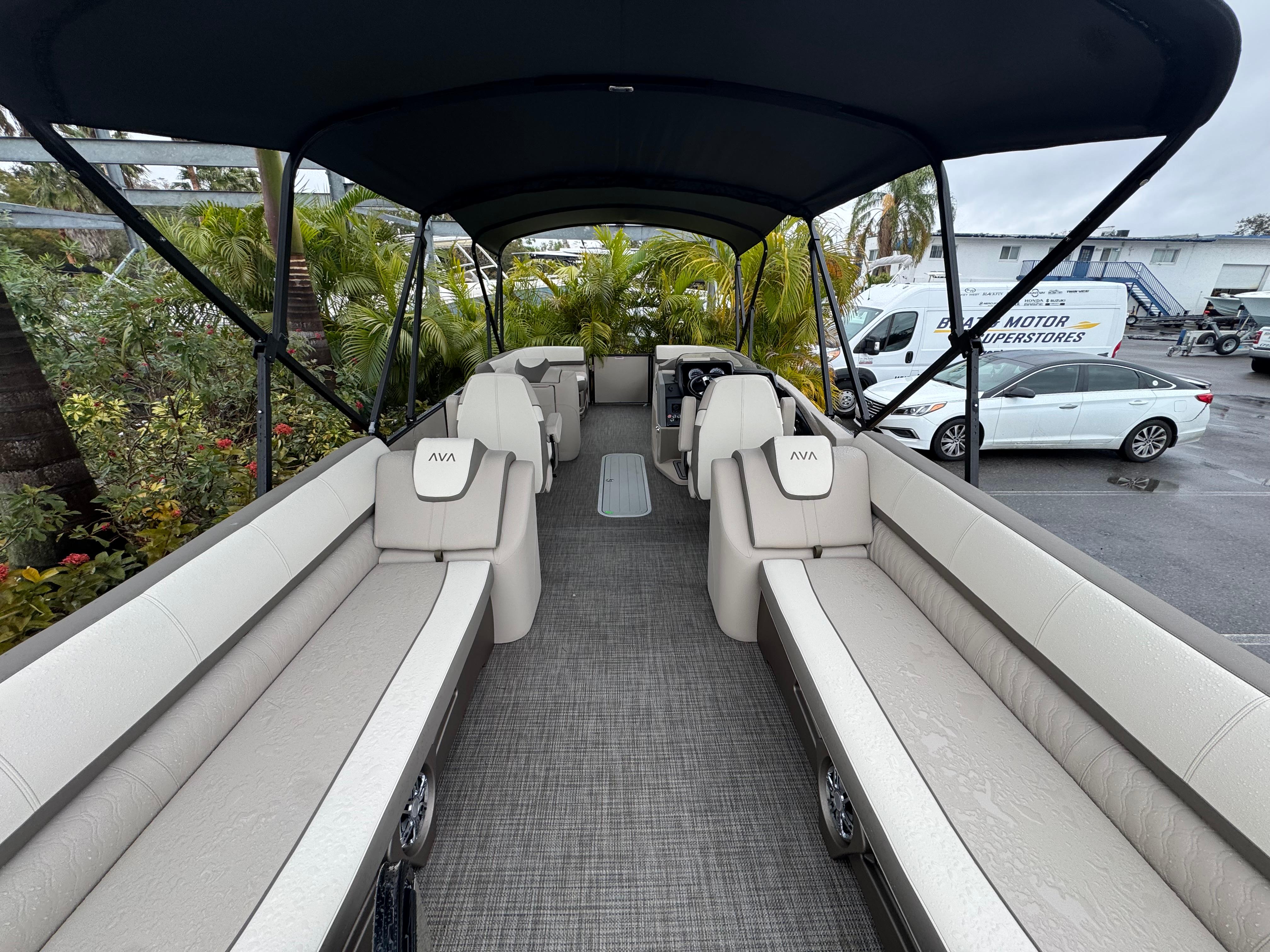 2025 Avalon Catalina Quad Lounge boat interior with spacious seating and canopy.