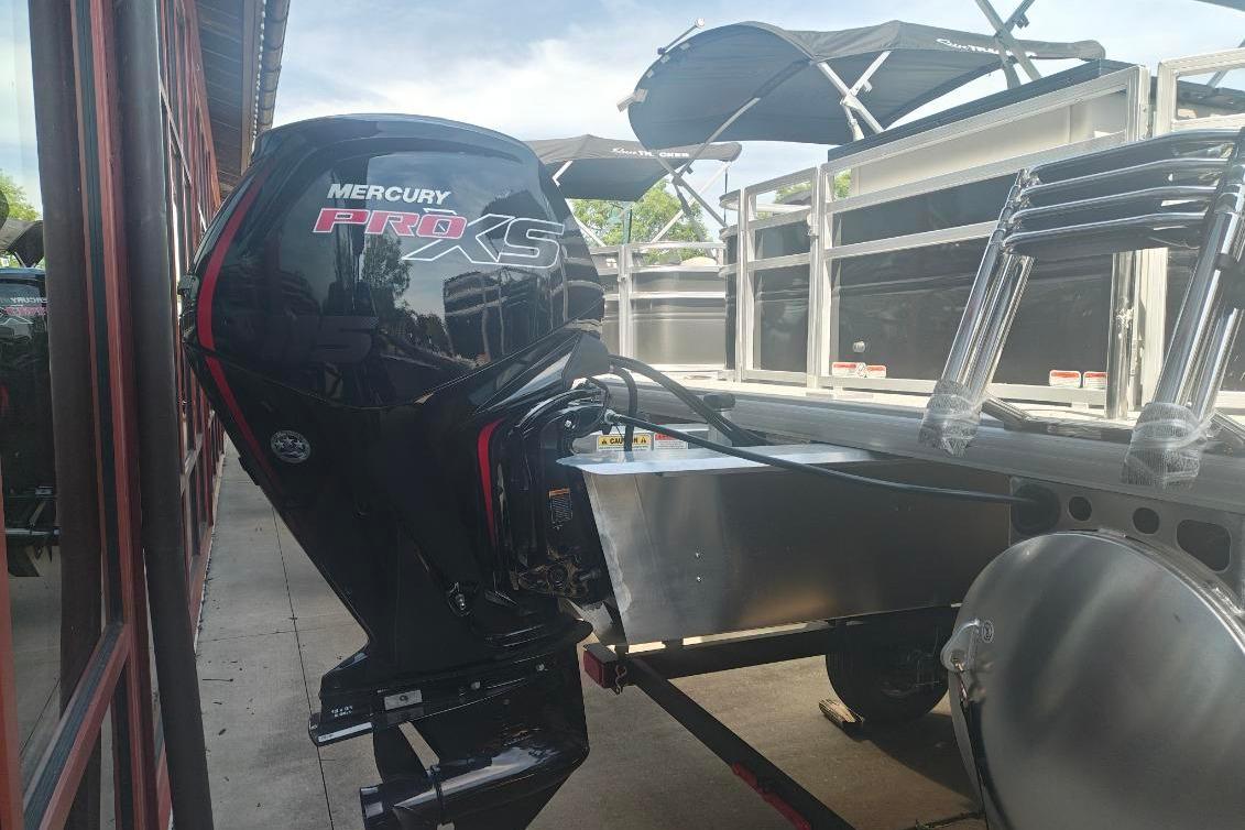 2026 Sun Tracker Fishin' Barge 20 DLX with Mercury Pro XS engine.