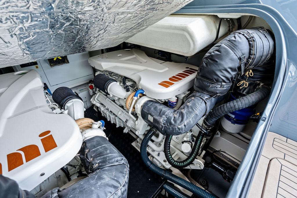 Engine compartment of 2024 Vanquish Yachts VQ55, showcasing advanced marine engineering.