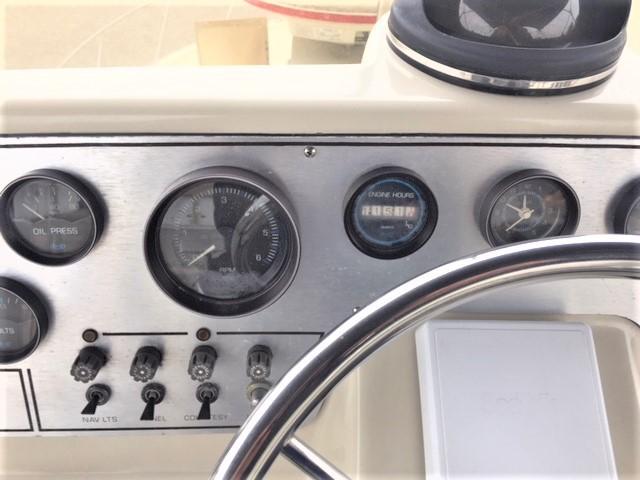1986 Silverton 40 Double Cabin dashboard with gauges and controls.