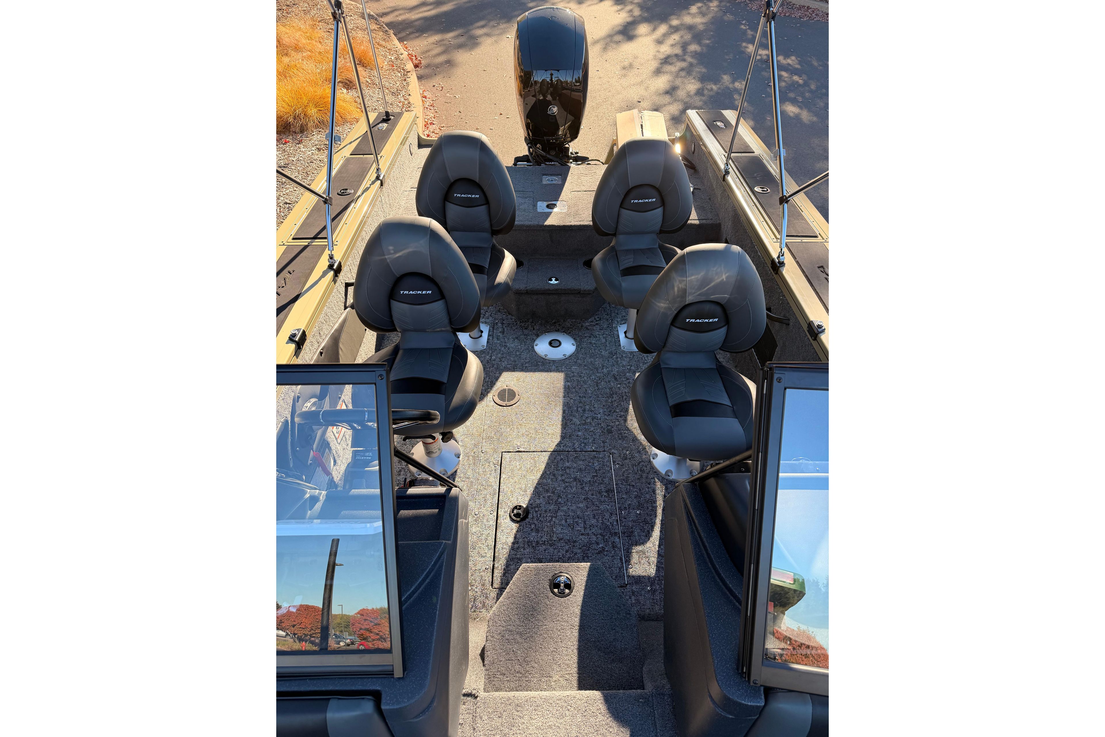 2026 Tracker Targa V-19 Combo boat interior with four seats and motor.