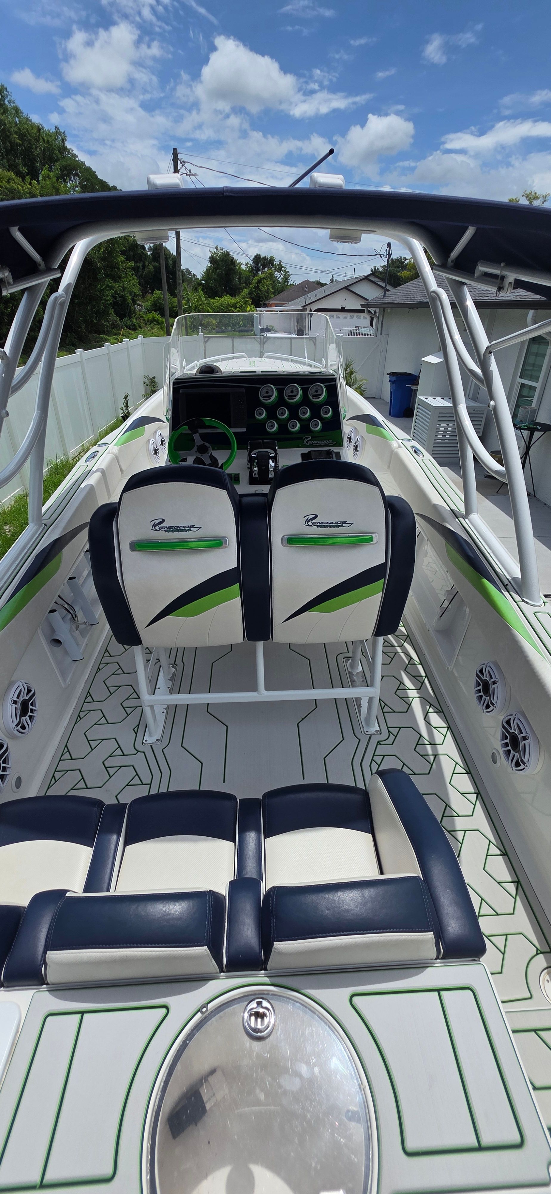 Interior view of a 2013 Renegade 32 FT boat with modern seating.