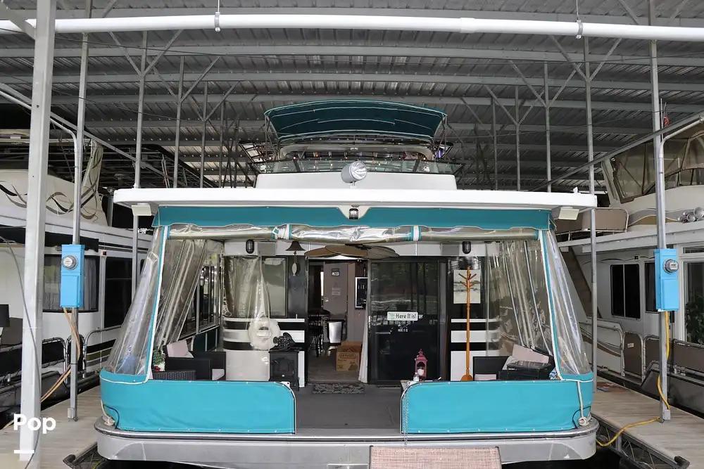 Houseboat docked in marina, Sumerset 16 x 70, 1990 model.