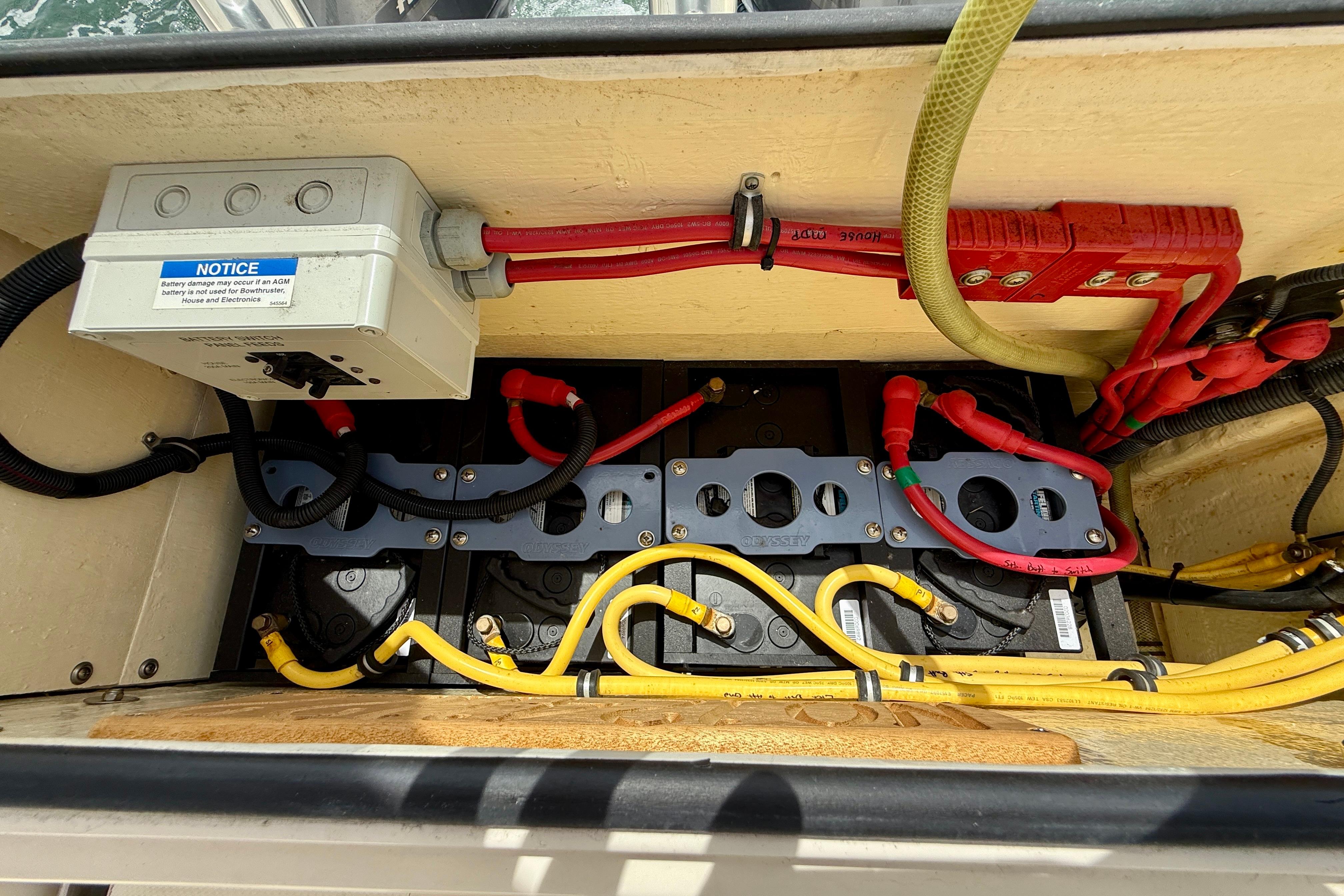 Electrical wiring and battery setup in a 2012 Pursuit OS 345 Offshore boat.