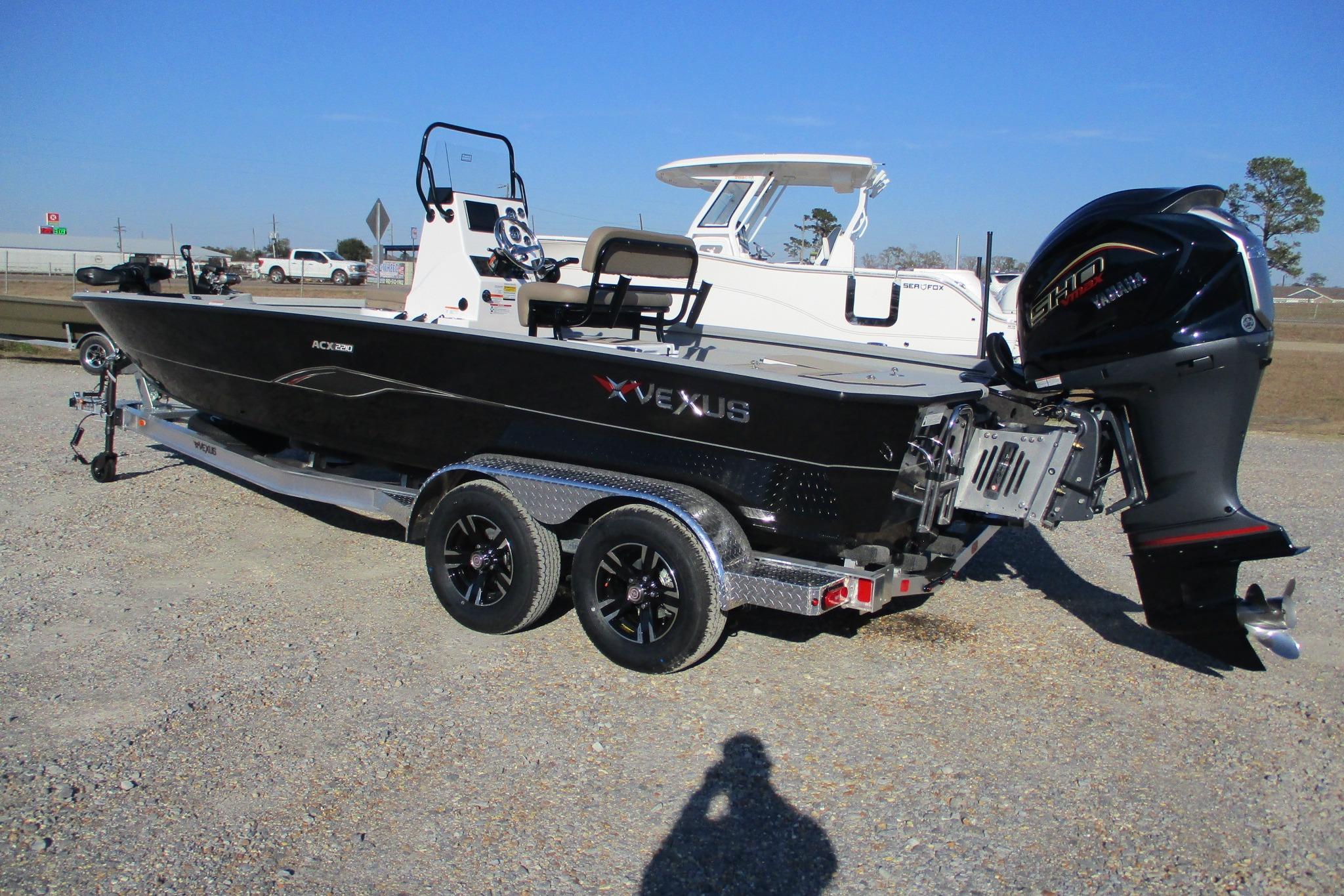 2026 Vexus ACX2210 boat on trailer, featuring sleek design and powerful engine.