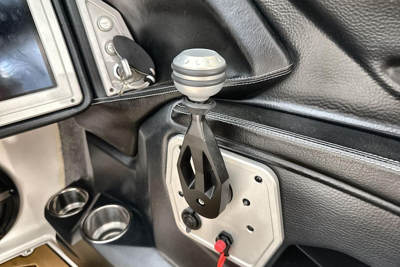 2020 Supra SE interior with gear shift, key ignition, and cup holders.